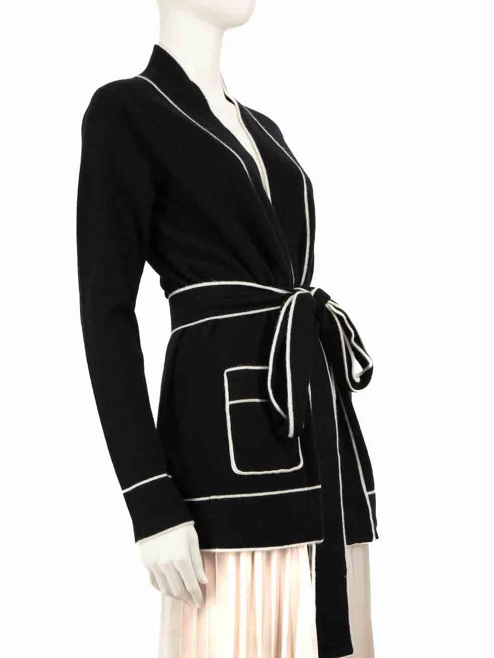 CONDITION is Very good. Hardly any visible wear to the cardigan is evident on this used Madeleine Thompson designer resale item.
 
 
 
 Details
 
 
 Black
 
 Cashmere
 
 Knit cardigan
 
 White contrast trim
 
 Belt tie
 
 Long sleeves
 
 2x Front
