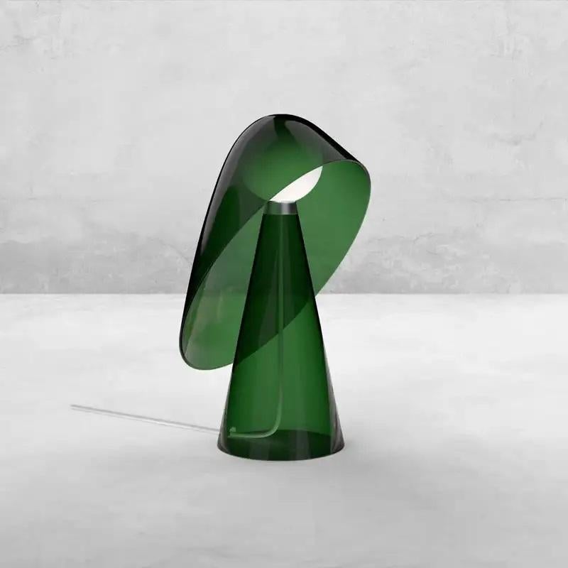Mademoiselle transparent green table lamp by Mason Editions
Designed by Quaglio Simonelli.
Dimensions: Ø 21.8 cm x H 30 cm.
Materials: transparent green Pyrex borosilicate glass.

All our lamps can be wired according to each country. If sold to