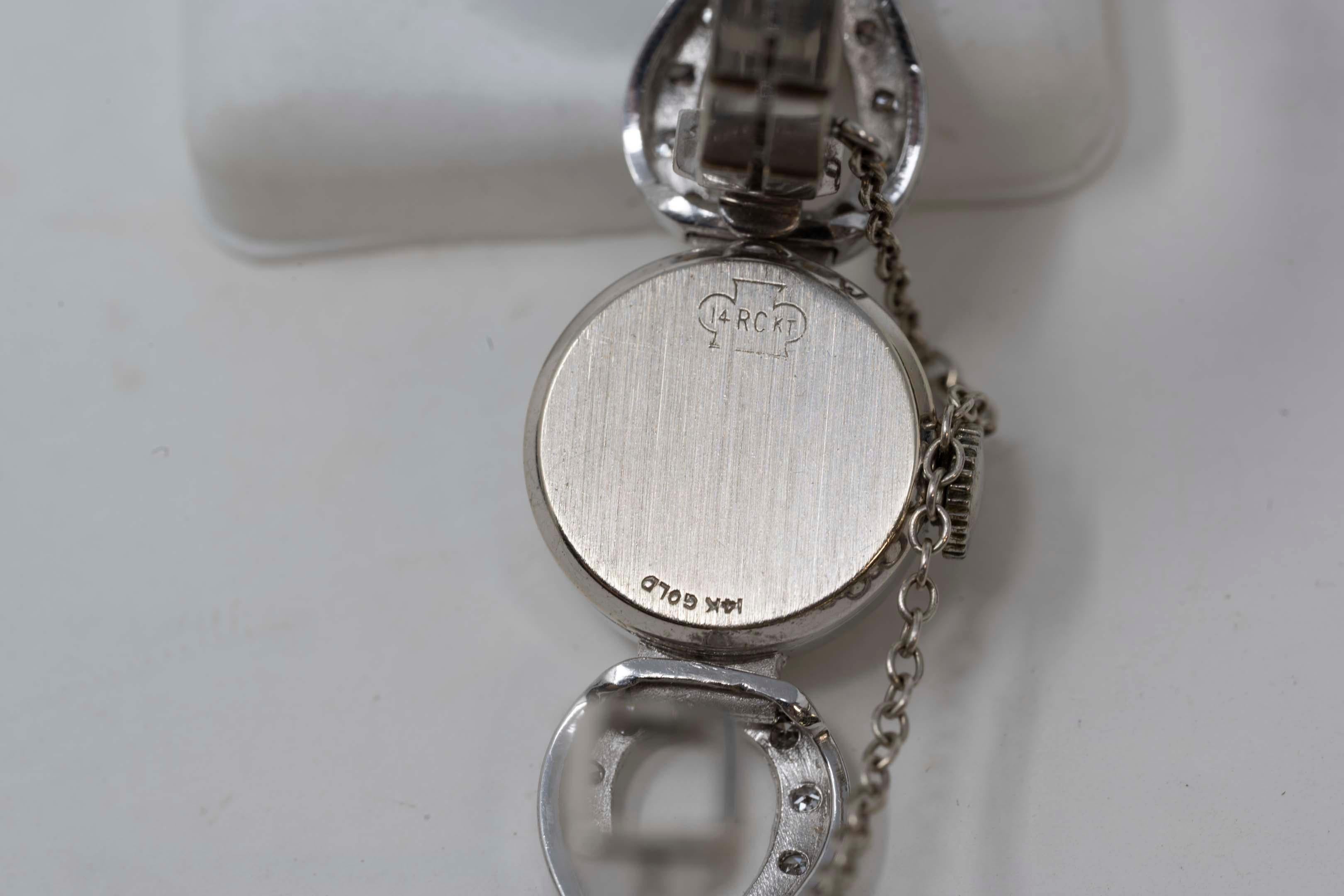 Montre Madison 21 en or blanc 14 carats et rubis pour femmes Pour femmes en vente