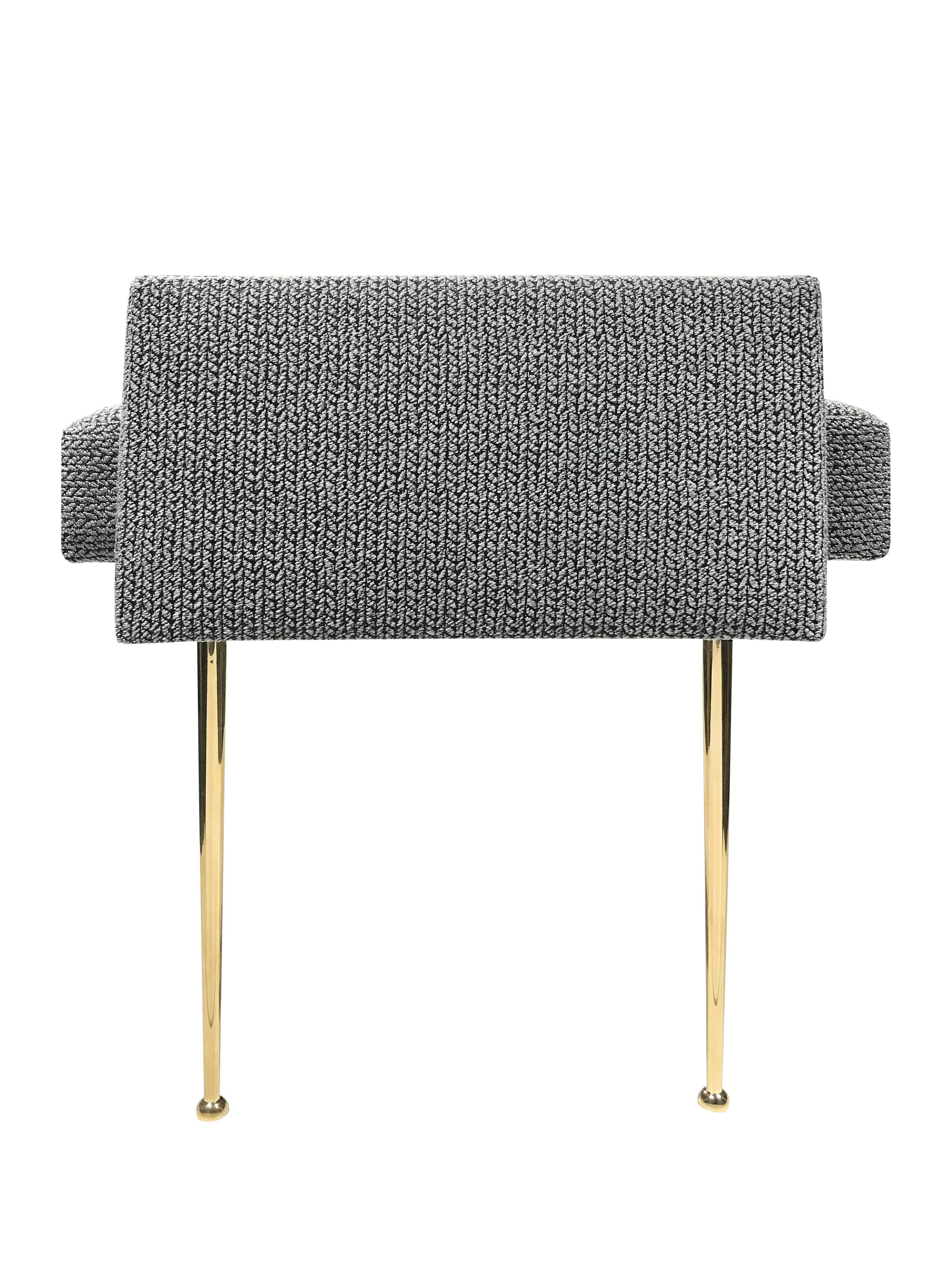 The Madison Arms bench, designed by Irwin Feld for CF Modern, has a plain cushion with two rectangular arms on either side. It stands on four polished brass Madison legs. 

CF Modern merchandise is available in custom sizes, wood and hardware