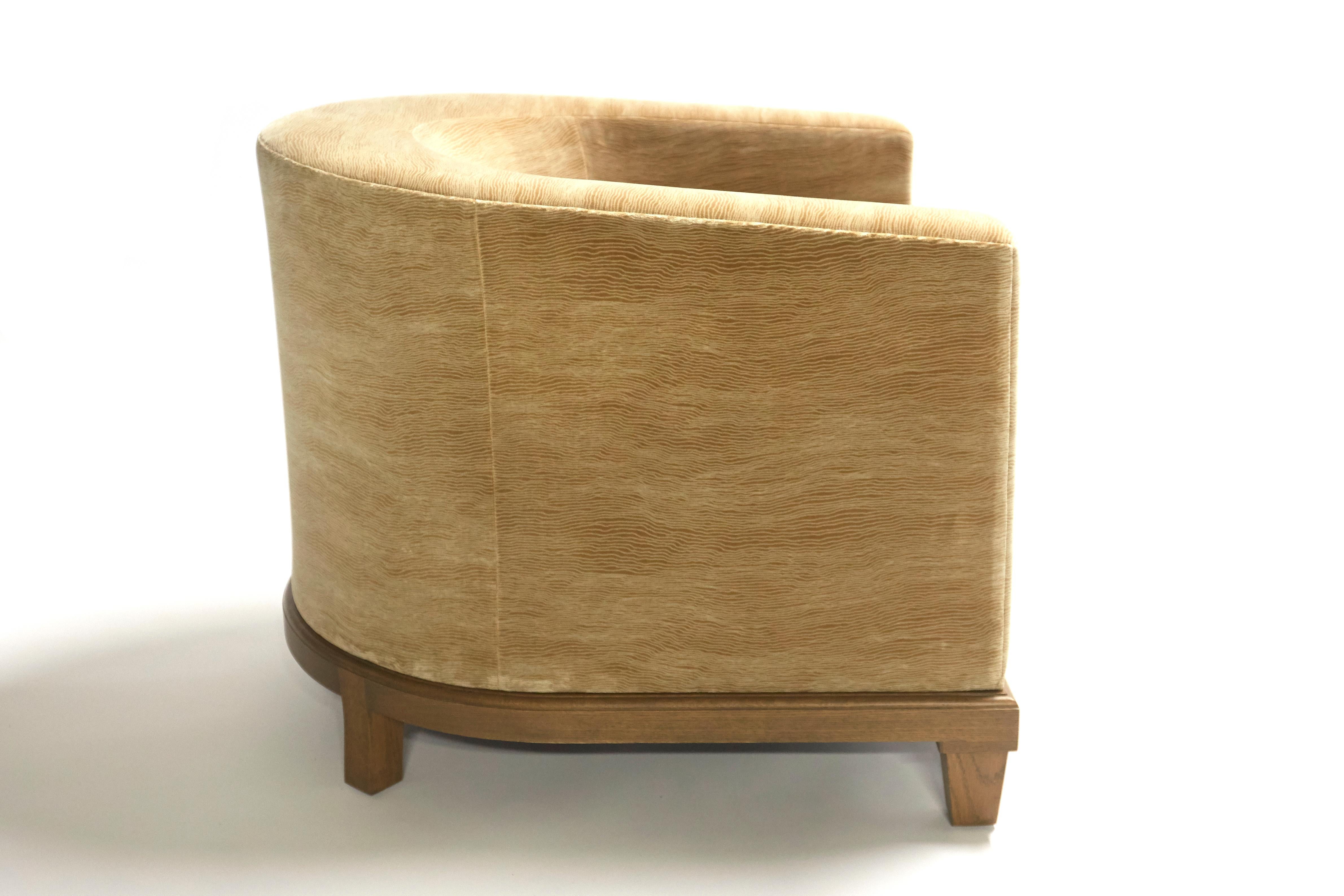 Curved, tight back lounge chair with loose seat cushion for maximum comfort and support. The Madison Chair frame is constructed using solid Maple wood wrapped with high density foam core and down fill. Four finishes available for wooden legs and
