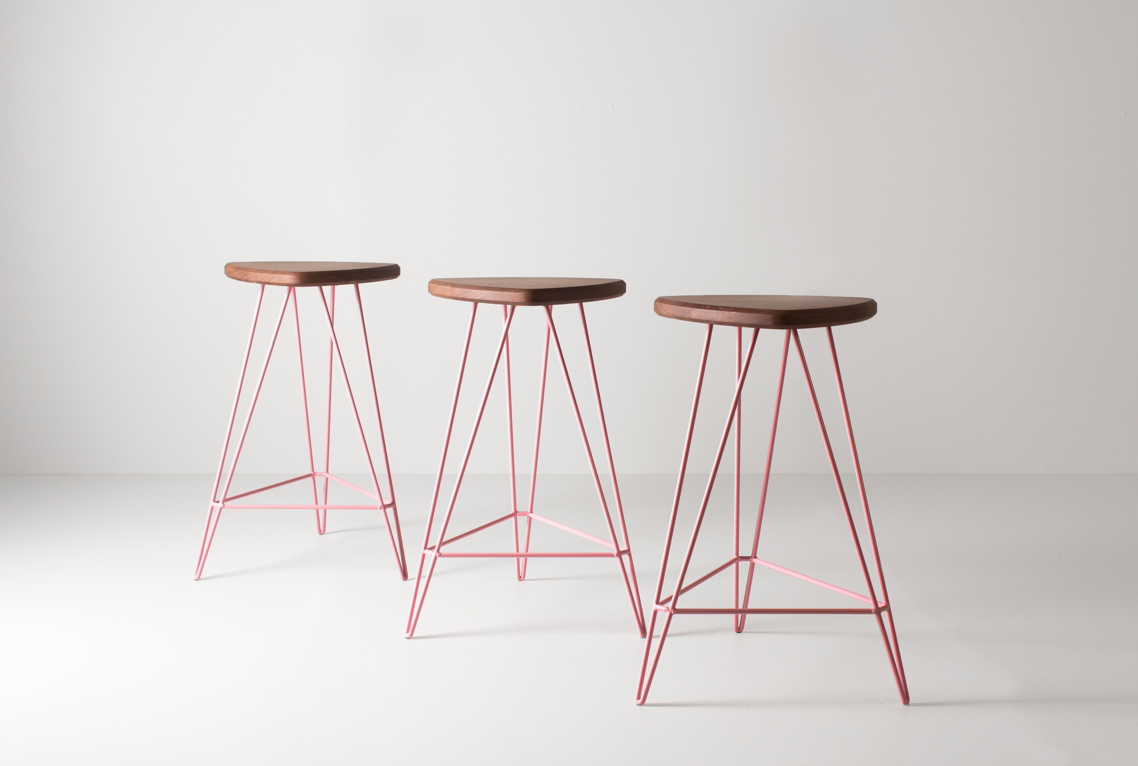 A well-designed piece of furniture blurs the line between functionality and art. The Madison stool is a geometrical masterpiece testing the boundary of what we think is possible with wire, balanced by the warmth and beauty of a natural wood seat. No