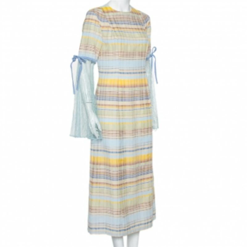 This maxi dress is from Madiyah Al Sharqi's Spring 2019 collection which is inspired by Lady Jackie Kennedy's trip to India. Highlighted by a mix of dreamy hues, the Madiyah Al Sharqi dress, made of cotton, features a simple neckline, zip closure,