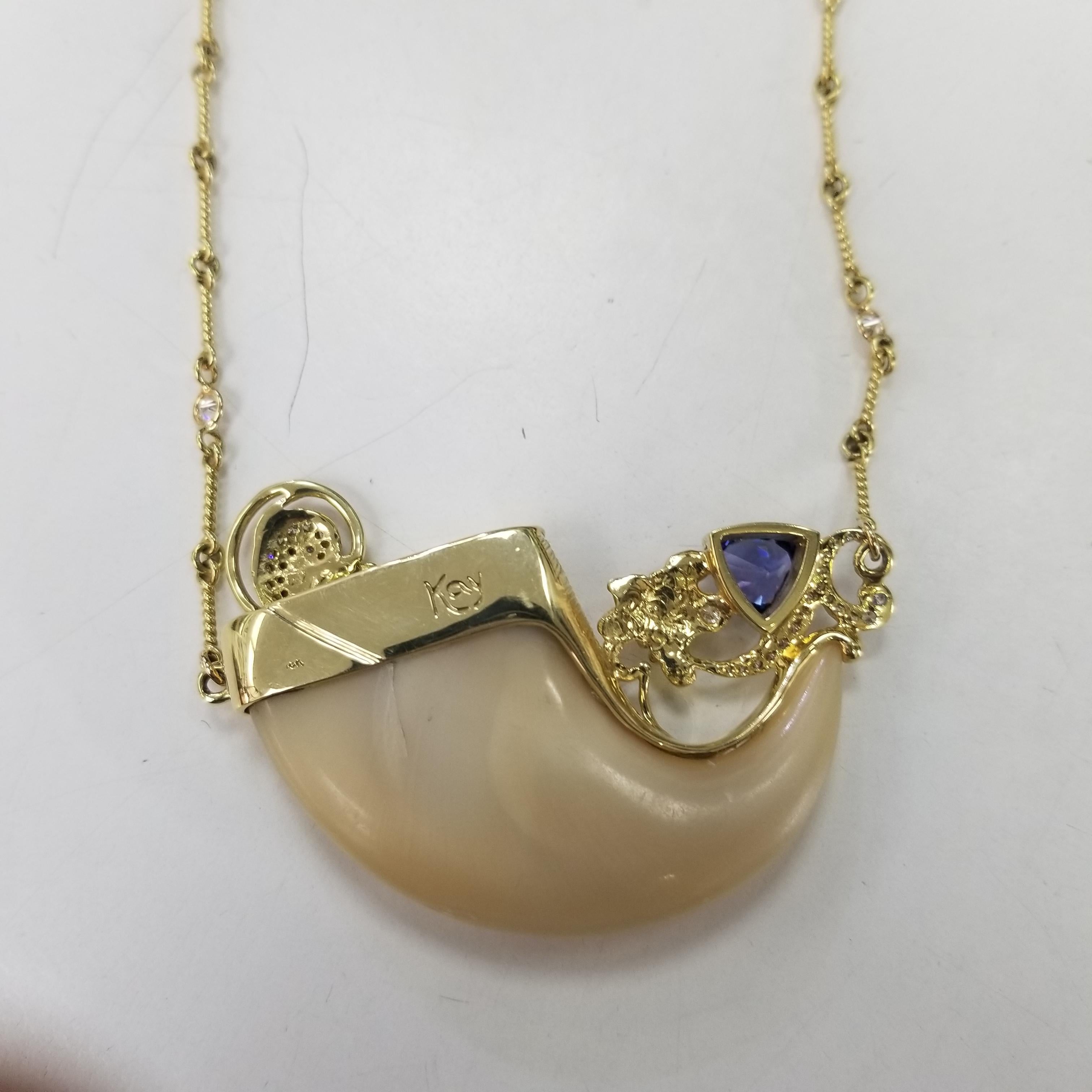 Madleine Kay: 18 Karat Gelbgold „Lion Claw“ mit Diamanten, gepolstert und Tansanit 1