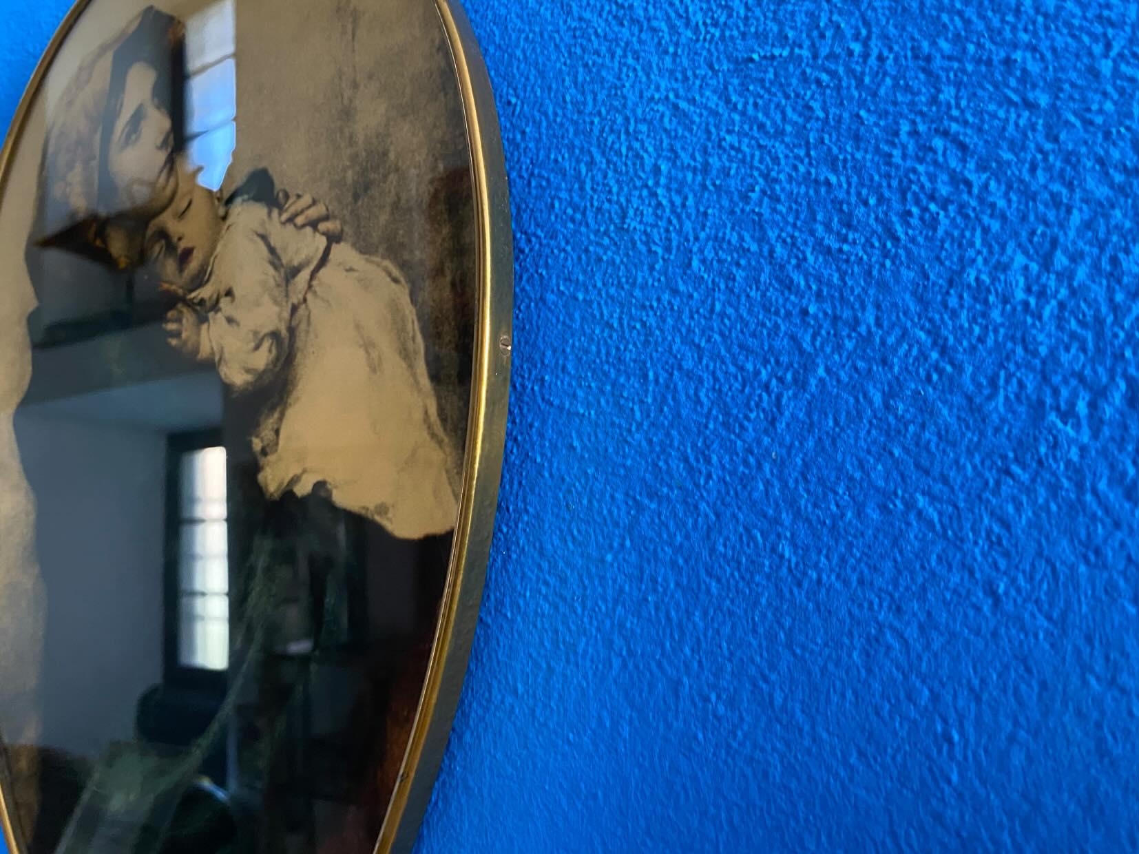 Madonna and Child in glass with a brass frame from the 1950s, a beautiful combination of modernity and religiosity, made in Italy in 1950
