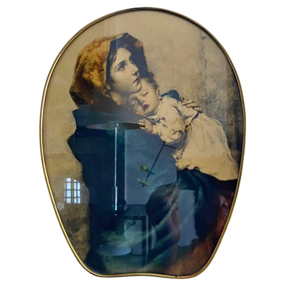 Madonna and Child in glass with brass frame from the 1950s