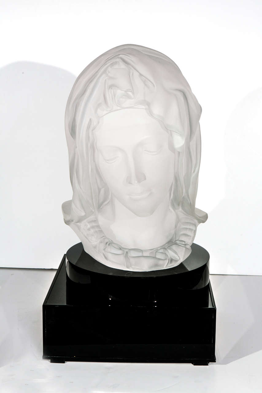 An amazing frosted acrylic sculpture of the Virgin Mary by New Renaissance Art. This was cast from the master made from the Vatican's mold of the original. The mold was created under the supervision of the Vatican's own artisans. This is piece is