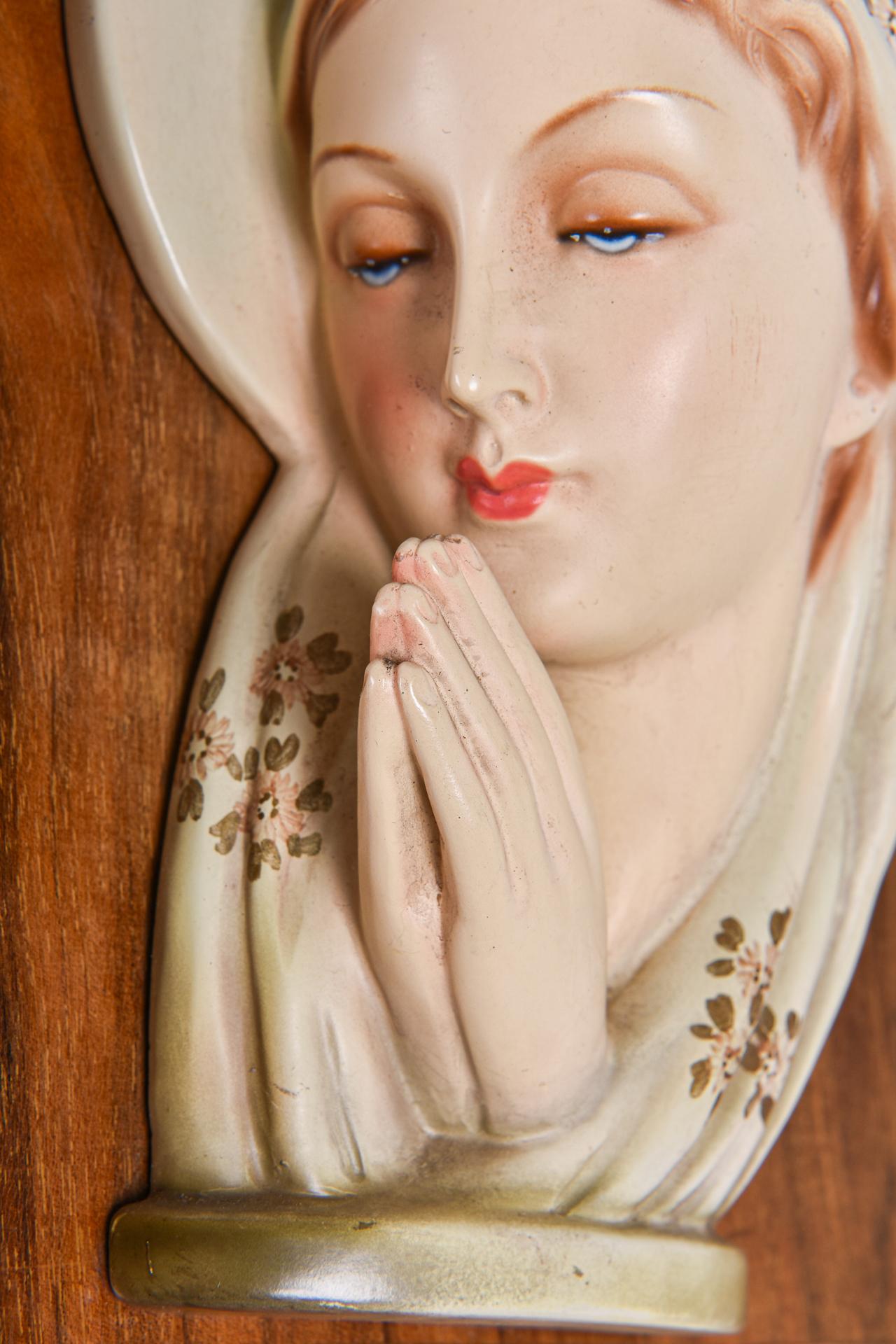 20th Century Madonna in Ceramic Bas Relief on a Wooden Panel For Sale
