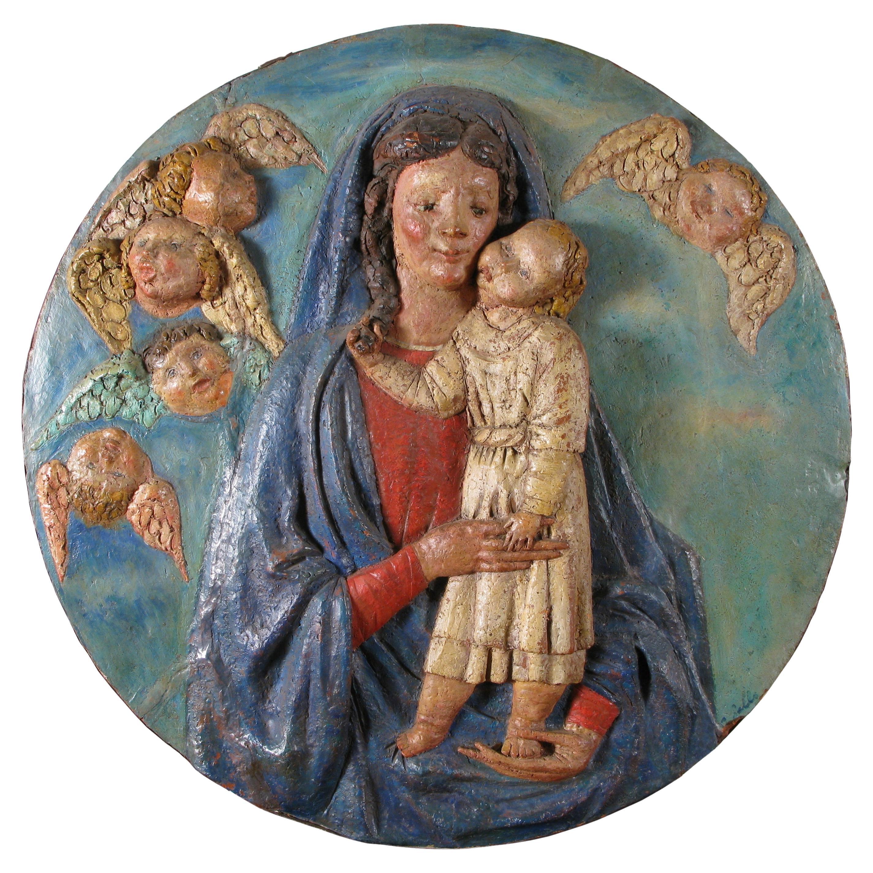 Vierge à l'enfant, tondo en terre cuite polychrome du 20e siècle en vente