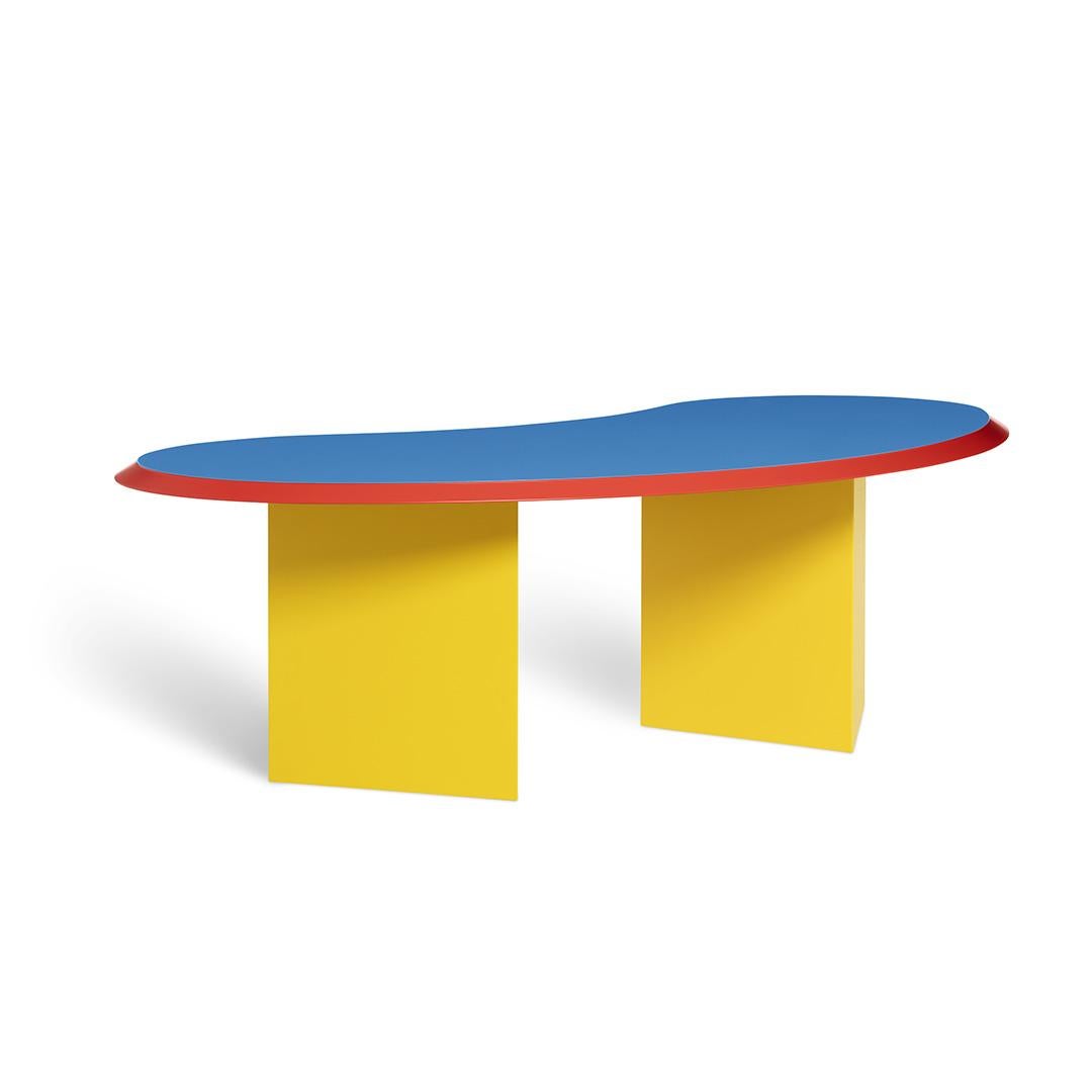 Madonna table in lacquered wood, designed in 1984 by Arquitectonica.

Memphis is the great cultural phenomenon of the 1980s that revolutionized creative and commercial logics in design. Born from the idea of Ettore Sottsass and a group of young