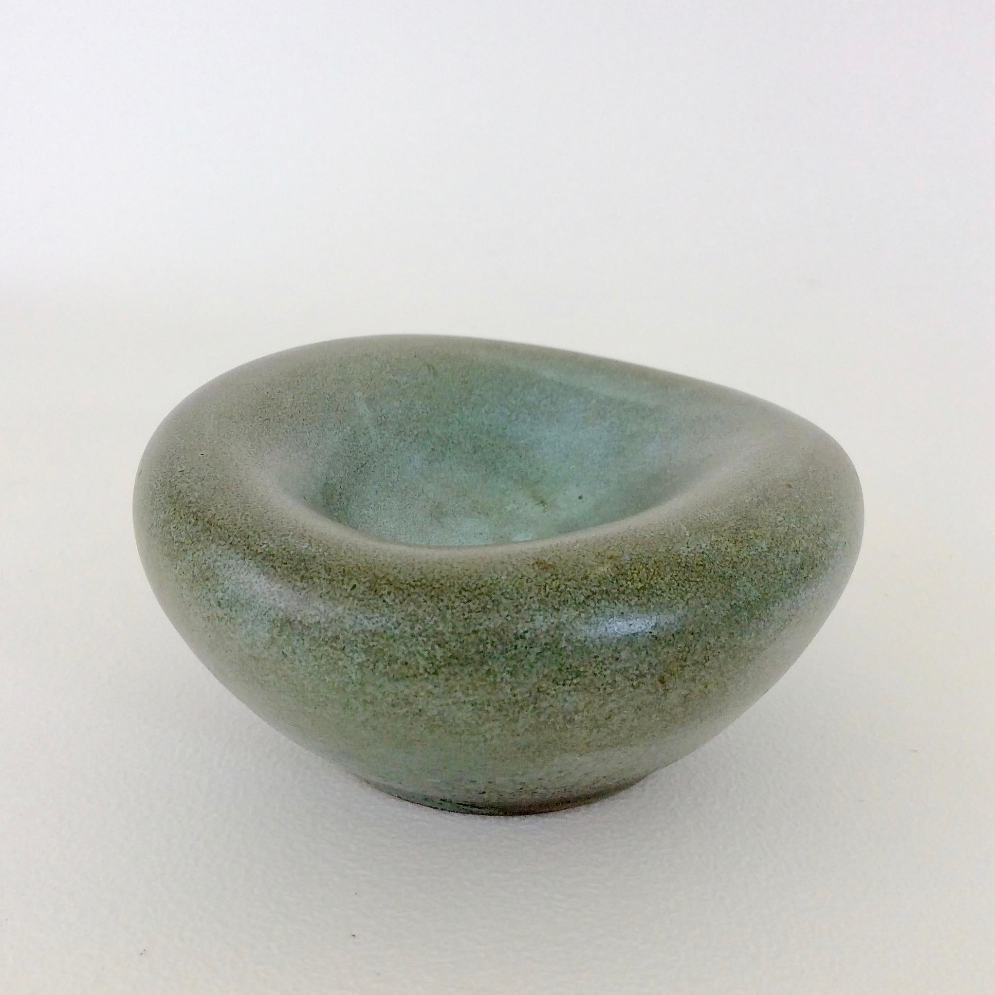 Nice Madoura bowl or vide-poche, circa 1950, France.
Grey-green ceramic.
Stamped Madoura underneath.
Dimensions: diameter 10 cm, 5cm H.
All purchases are covered by our Buyer Protection Guarantee.
This item can be returned within 14 days of