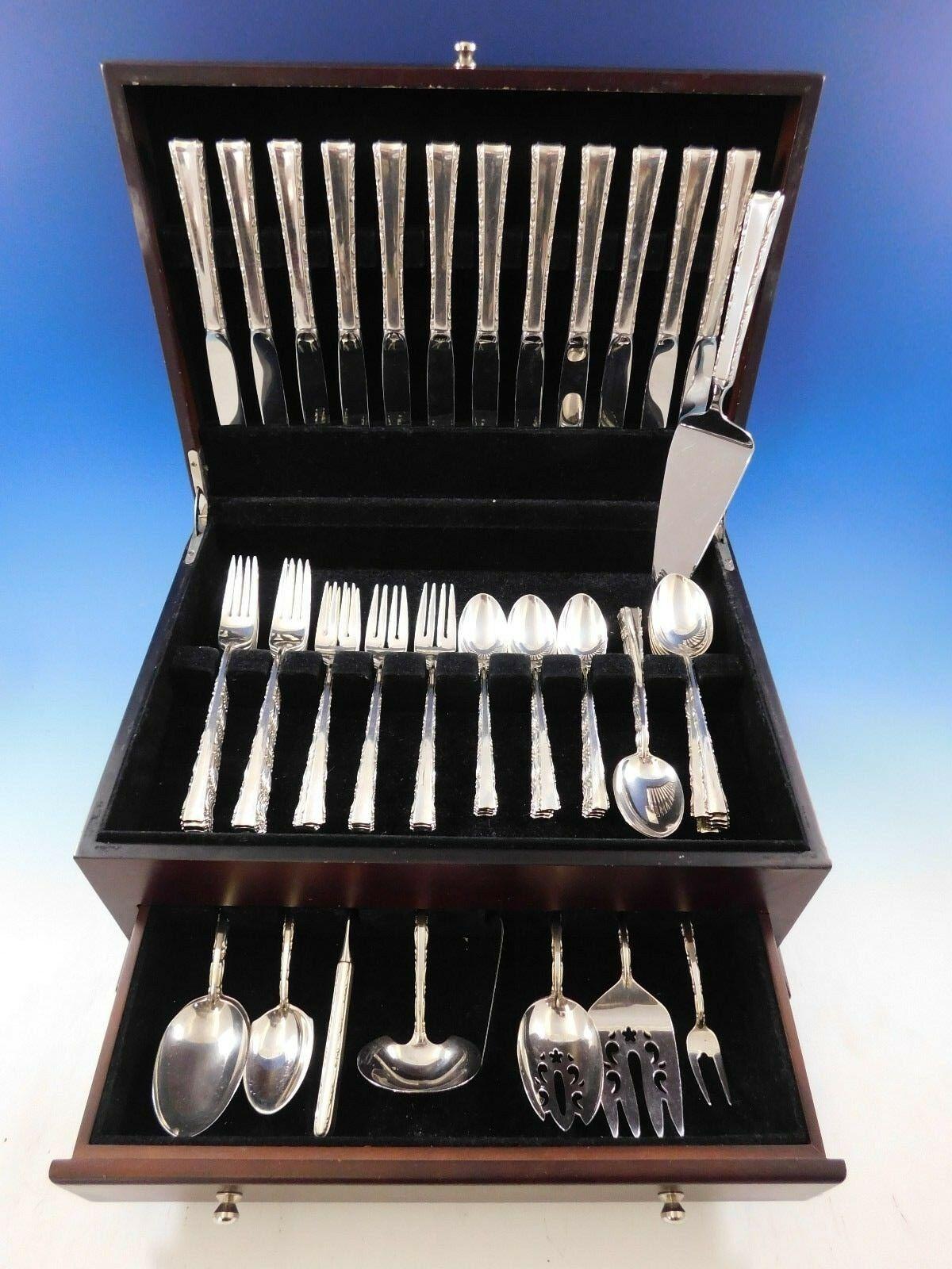 Madrigal by Lunt sterling silver flatware set of 63 pieces, in excellent condition.This set includes:

12 knives, 9