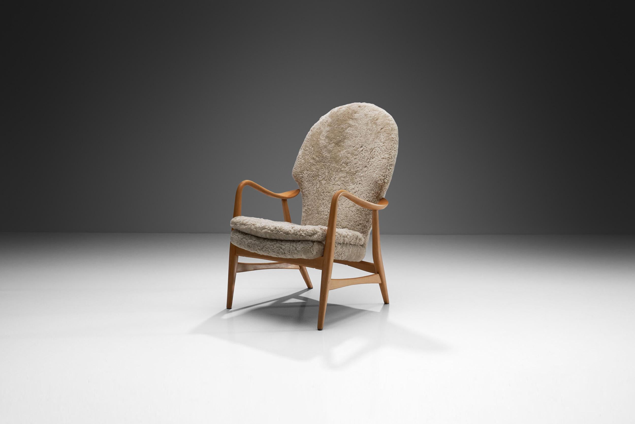 This rare model of Danish design duo Madsen and Schubell is a great example of Danish mid-century modern design. The 1950s in Denmark saw a renewed focus on comfort and craftsmanship, merging traditional woodworking skills with the evolving
