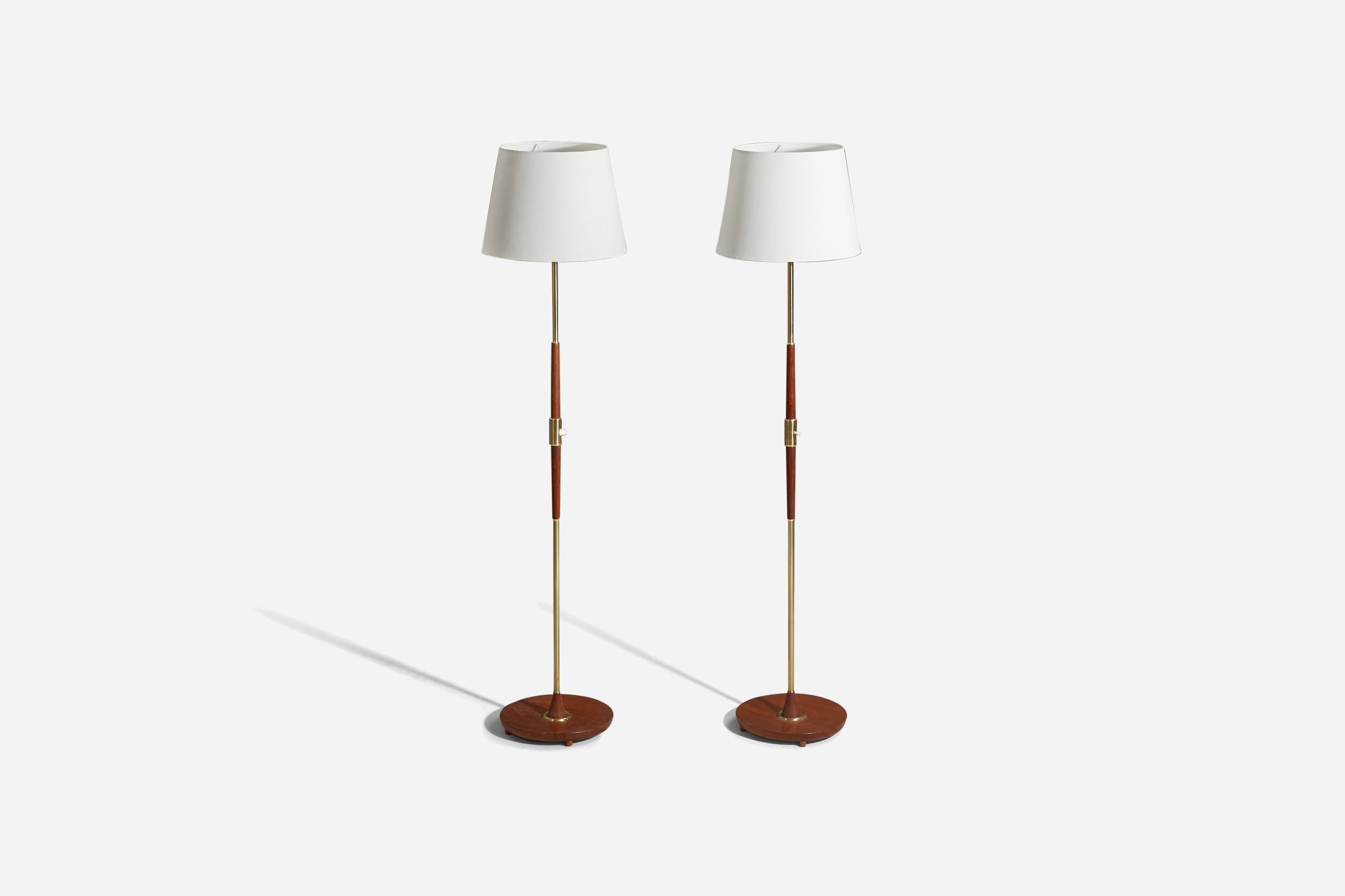 A wood, brass and fabric floor lamp designed and produced by MAE, Sweden, 1950s.

Sold with Lampshade(s). 
Stated dimensions refer to the Floor Lamp with the Shade(s). 

Socket takes standard E-26 medium base bulb.
There is no maximum wattage stated