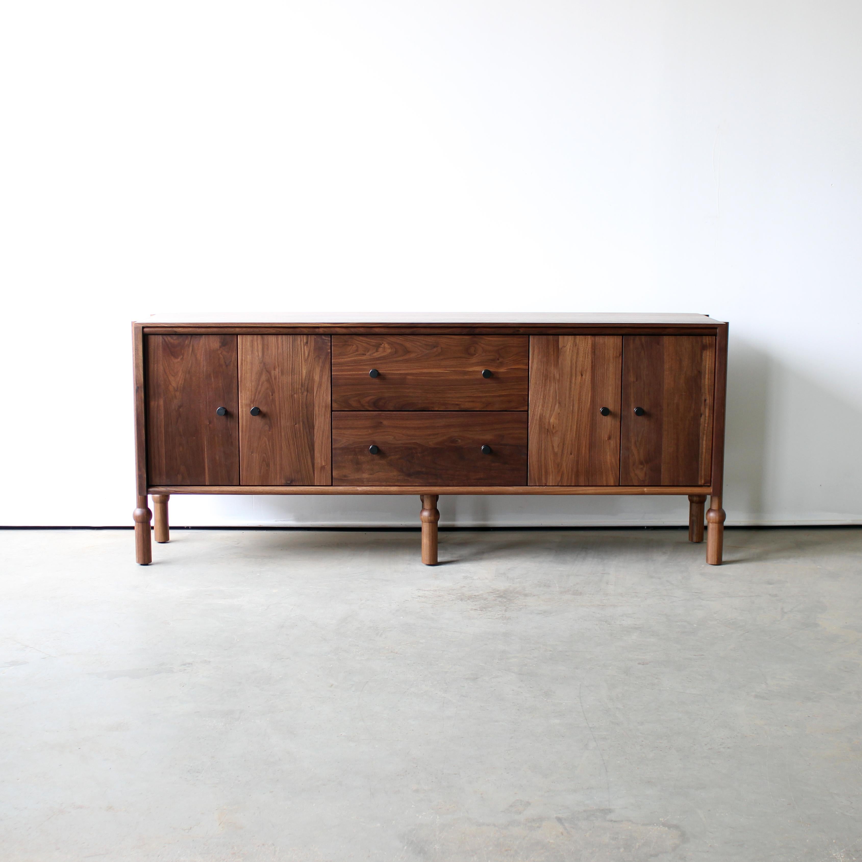 Solid wood case / hand-turned legs / hand rubbed oil finish / solid brass pulls / premium, full extension, soft close drawer slides / solid wood, dovetailed drawer boxes

Dimensions: 72” W x 18” D x 30” H

Customizations available

Wood options: