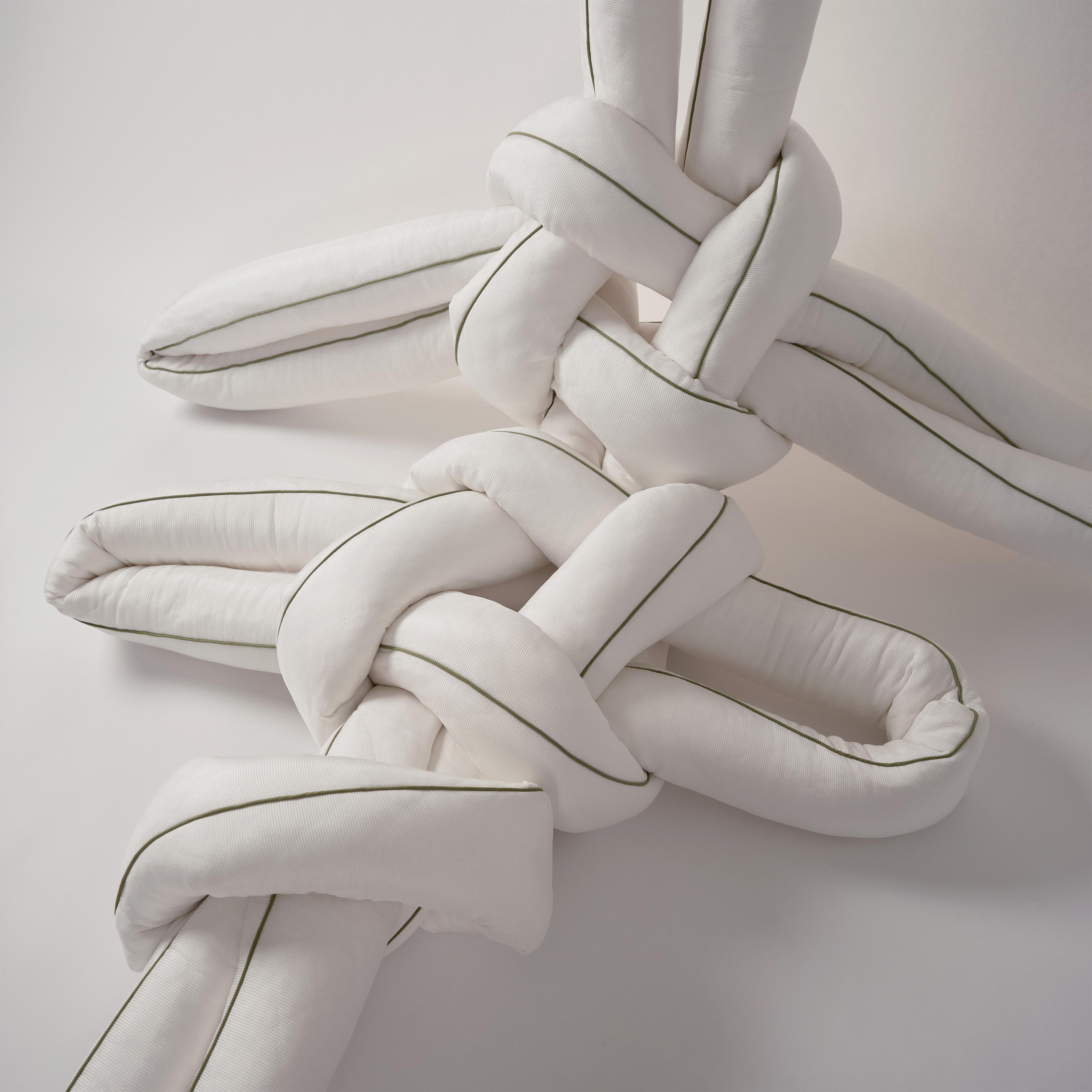 Maeduep. Dragonfly, 2022 by WKND Lab 
From the series Tying Wishes 
Technique: Korean Traditional knot
Material: Cotton, expandable polypropylene rayon, polyester filling
Size: 160.0 x 50.0 x 40.0 cm (Φ13.0) 
Color: White
(seat, cushion, wall