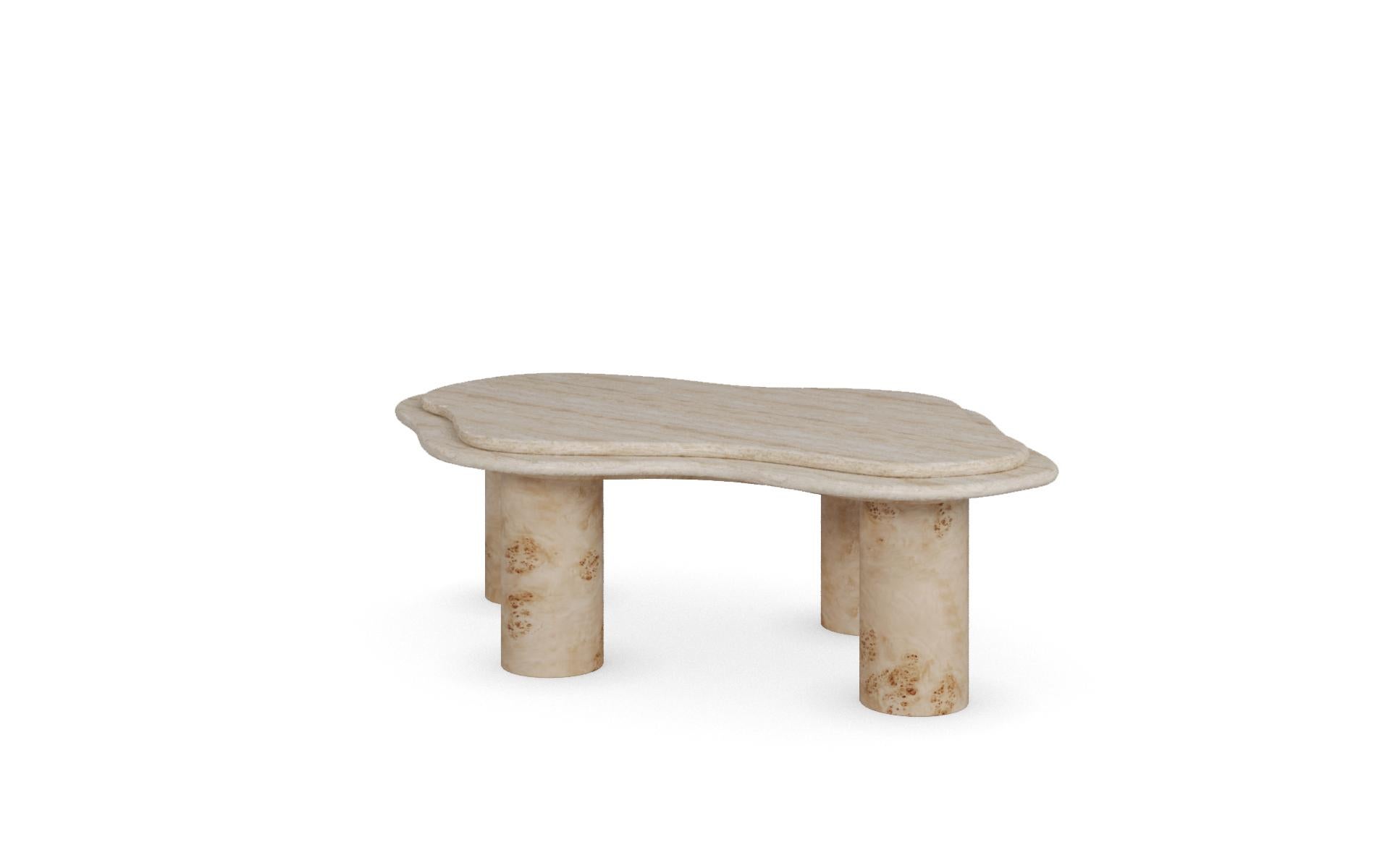Maelis Coffee Table is an organic form poplar root coffee table, conceived as a layered sculptural volume that anchors seating areas with quiet authority. Its geometry balances materiality and spatial flow. The piece is realised as a sculptural