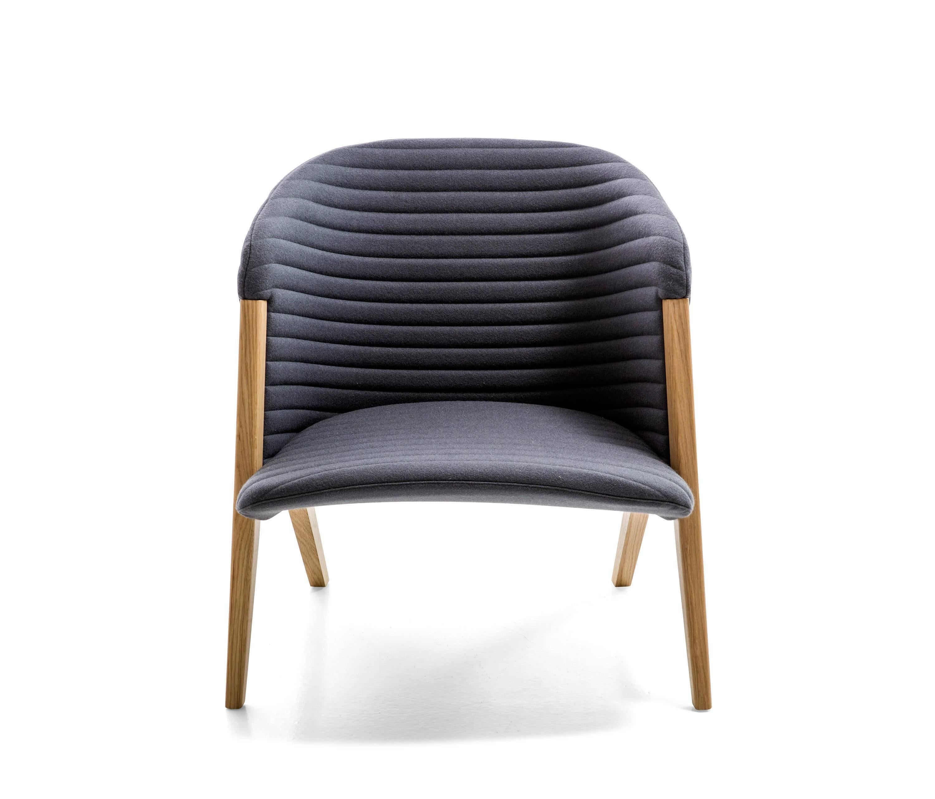 Light and welcoming in shape and character, Mafalda brings together three conceptually distinct components to form a single body: seat, shell and wood base. The result is a distinctive, almost humorous, character. The name is deliberately borrowed