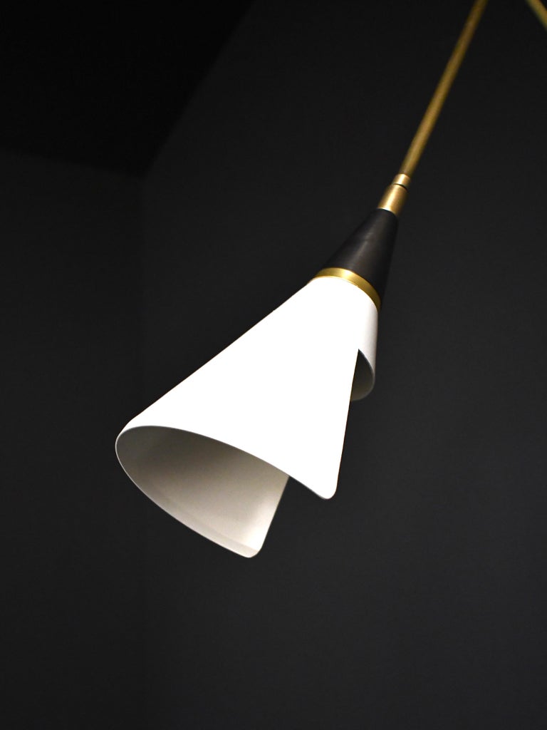 The Magari wall lamp or reading light is handmade to order by Blueprint Lighting. Magari is adjustable to suit your needs: there are two articulating joints and the shade has a swivel mechanism for rotation. This design is strongly influenced by