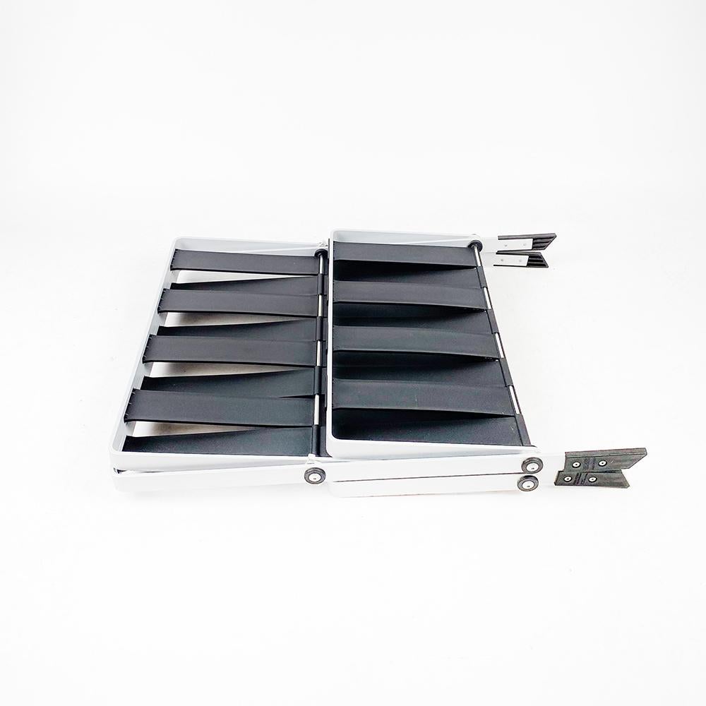 Contemporary Magazine rack 2400 News, design by Raul Barbieri for Rexite. For Sale