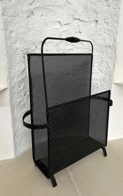Magazine rack designed by Mathieu Mategot in perforated metal, circa 1950