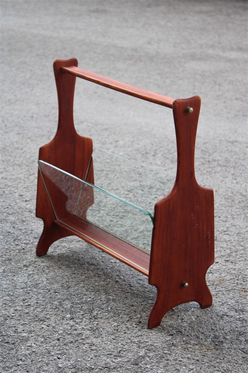 Magazine rack in shaped wood midcentury Italian design cassina.