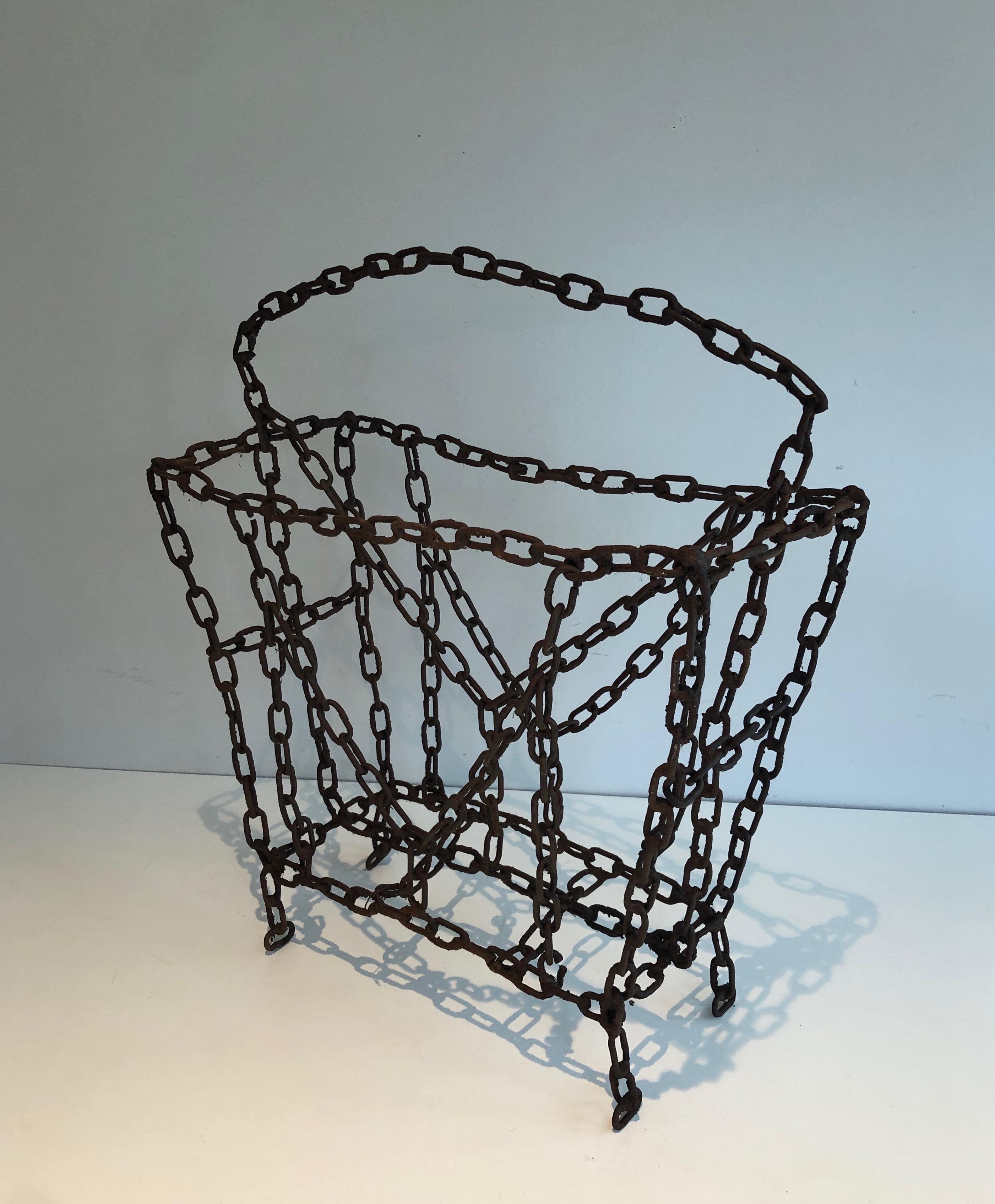 This magazine rack is made of iron chains. This is a Frenchwork. Circa 1970.