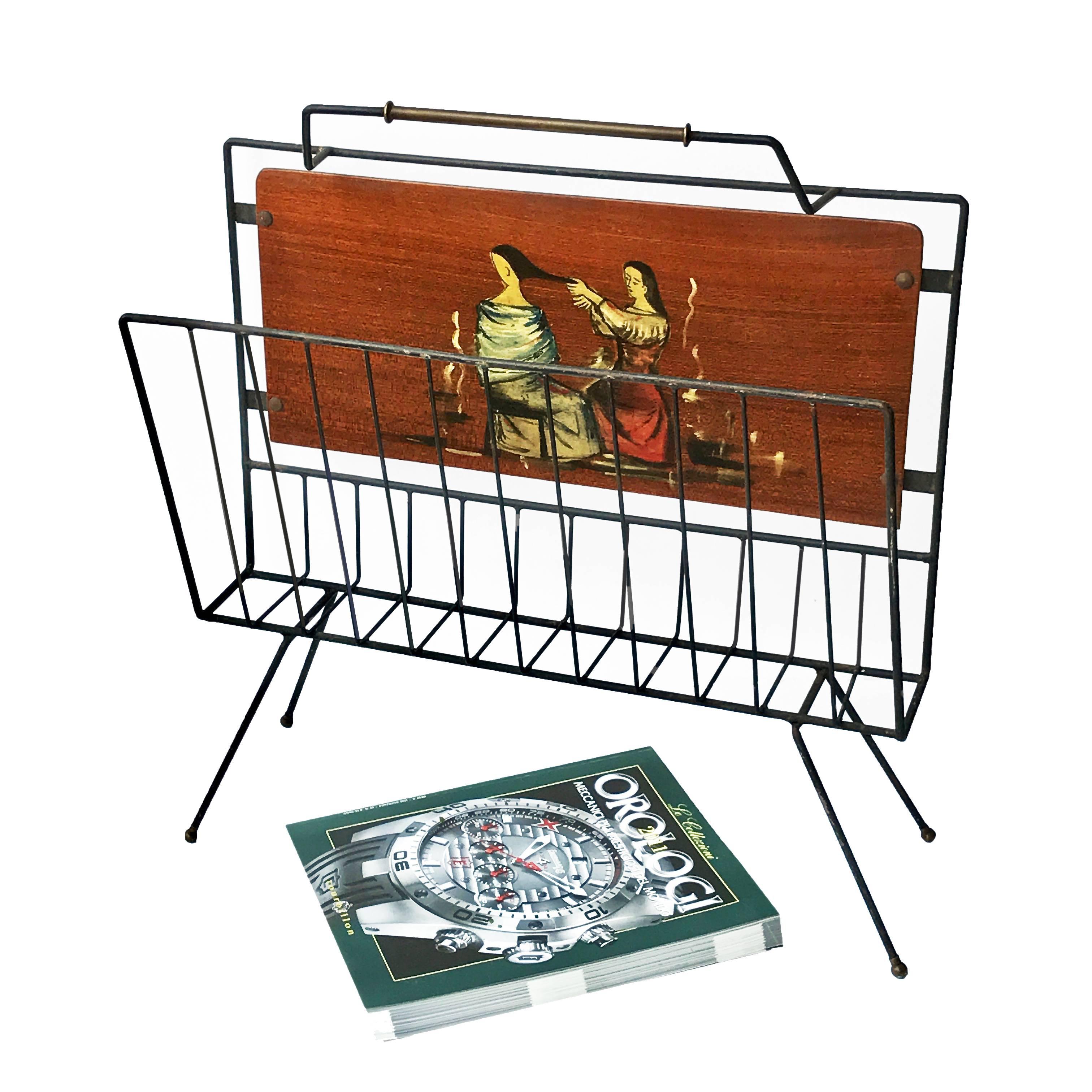 Magazine rack the enamelled iron and painted wood, 1950s.