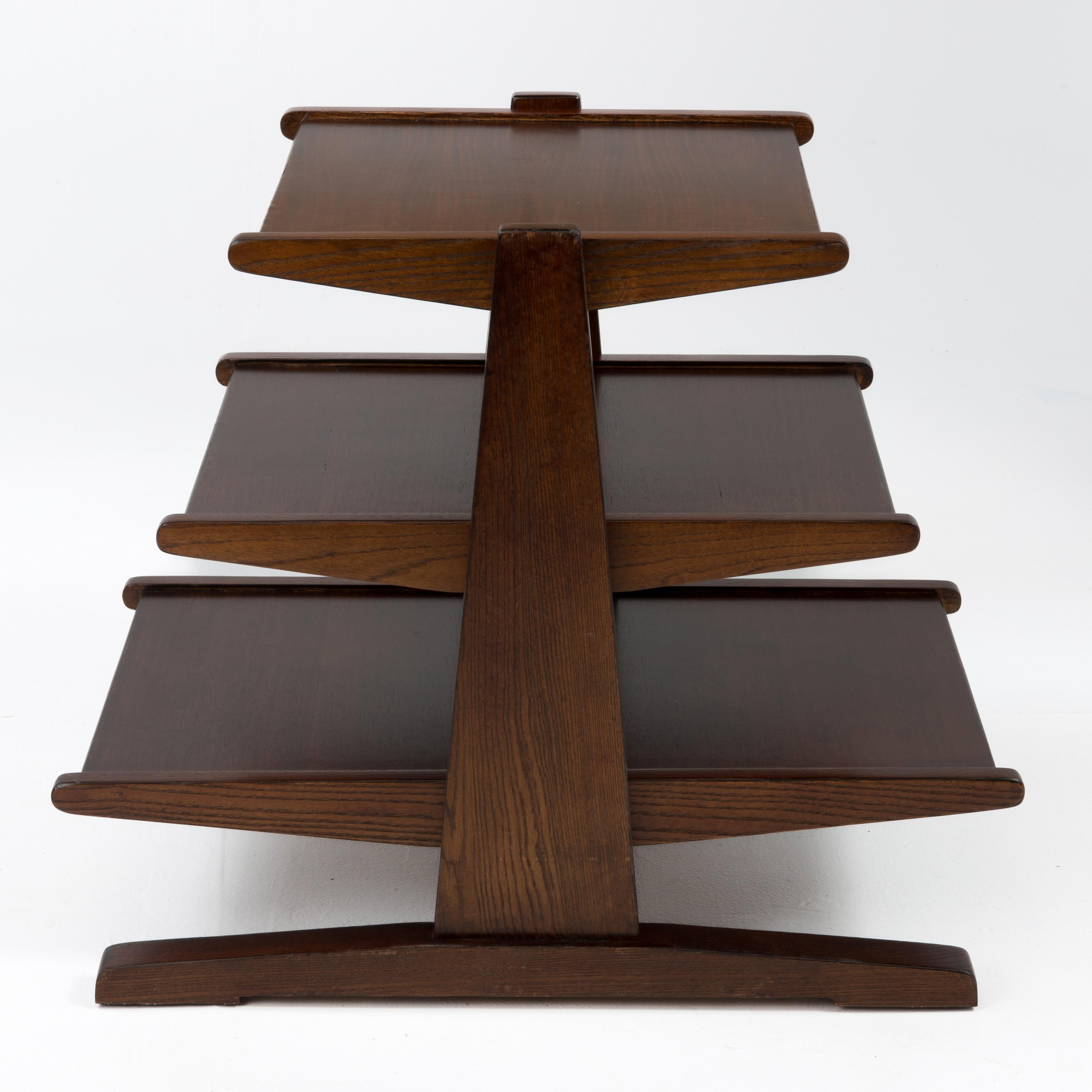 A three shelf magazine tree or table after the iconic Edward Wormley design for Dunbar.