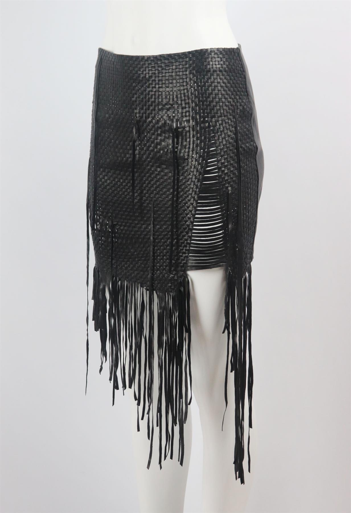 Crafted from soft, supple lamb leather, Magda Butrym's Norwich skirt is the bohemian creation of our dreams, this skirt has been crafted from woven leather in a loose structure finished with a stretch-jersey slip skirt and dramatic fringed detail