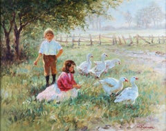 Enfants avec des oies à la lumière d'une soirée d'été