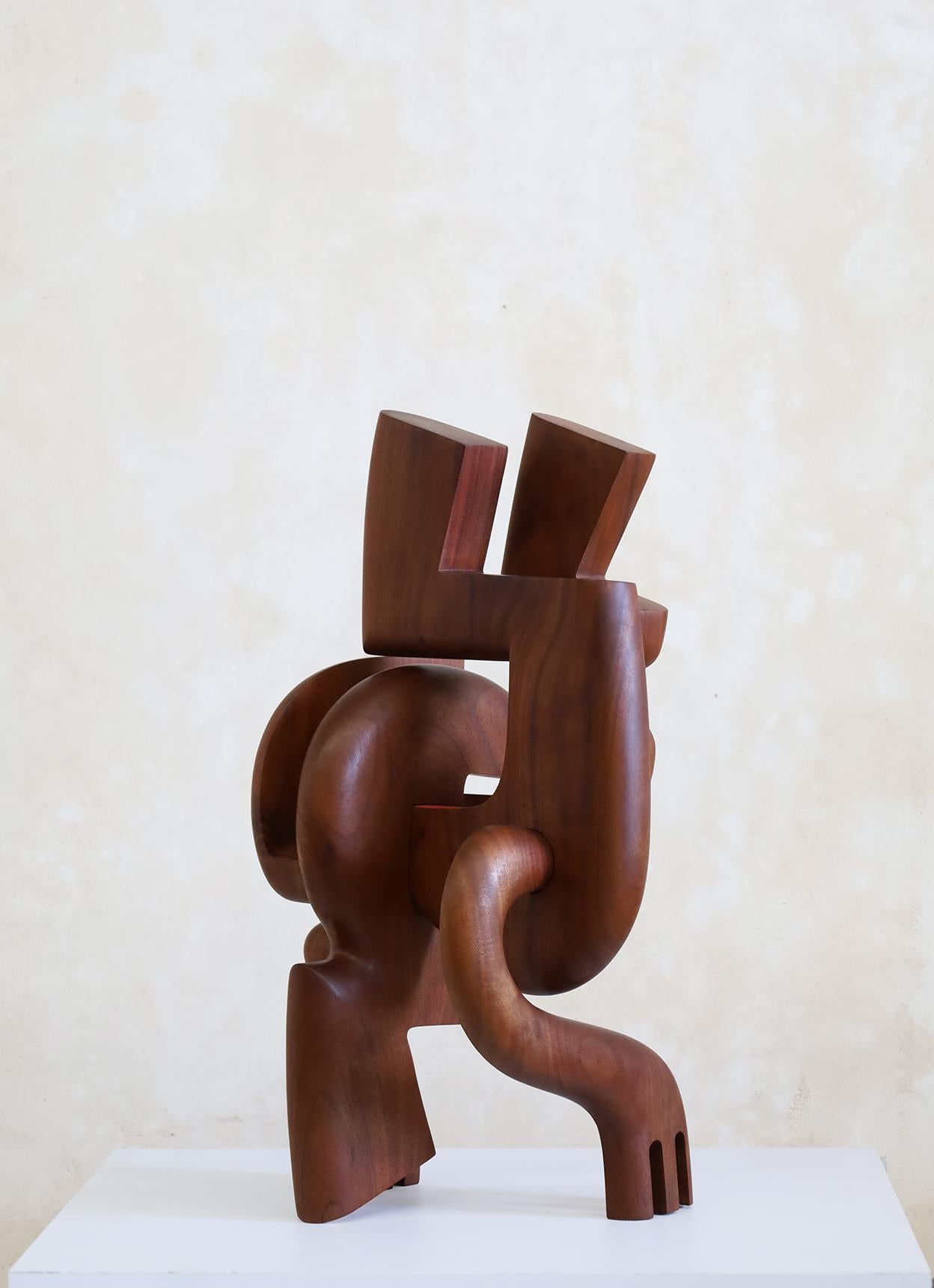 Magdiel Garcia is a contemporary Cuban artist whose work evolves around the human figure, volumes and color. He is passionate about wood, which he selects very carefully to obtain an inmense sensual dimension in his pieces.  Each sculpture from
