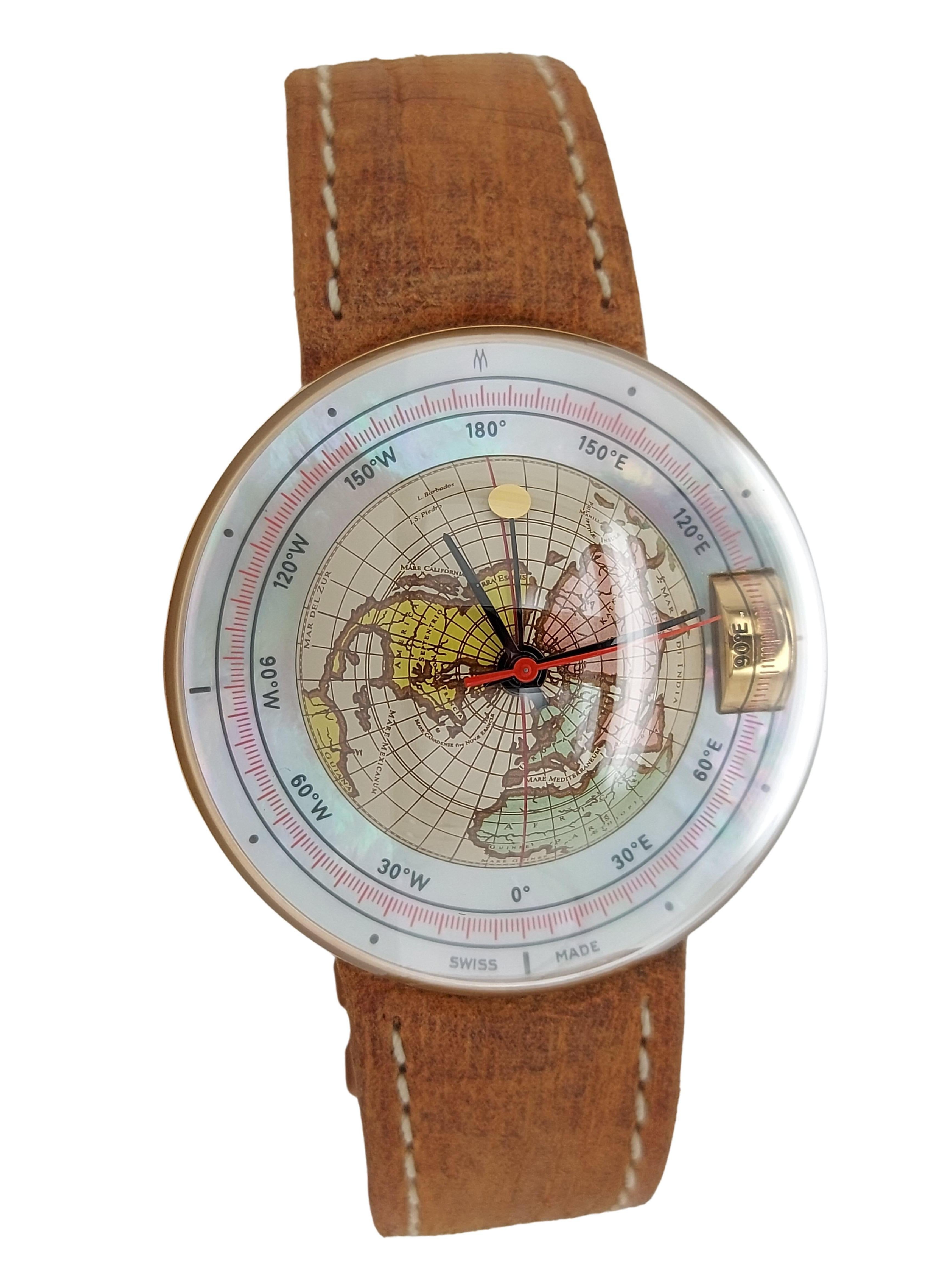 Very special Magellan world time clock depicting the 3D northern hemisphere!

Reference: 1521 NH

Movement: Automatic Self winding, Mechanical movement

Case: 18kt yellow gold, Case diameter 44 mm, Thickness 20 mm, Water Resistant 3ATM, The crown is