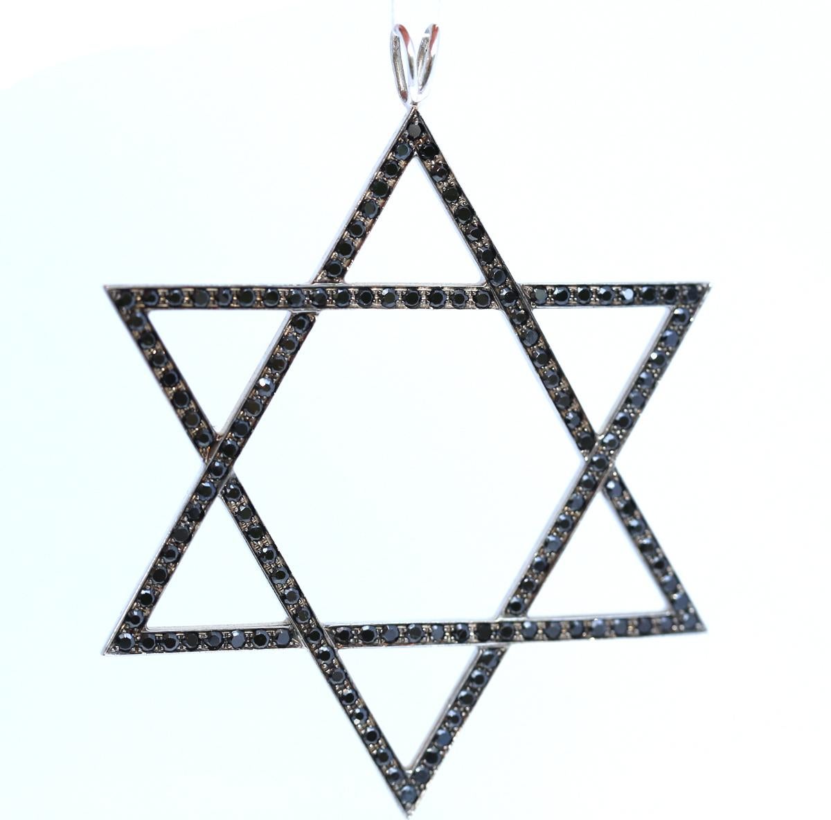 Magen David 18 K White Gold Massive Pendant. Created around 2000.

Magen David is an ancient Judaic symbol in it’s modern very clean and stylish interpretation. 18K White Gold set with round cut Onyx stones.

A proud symbol of identity and a cool