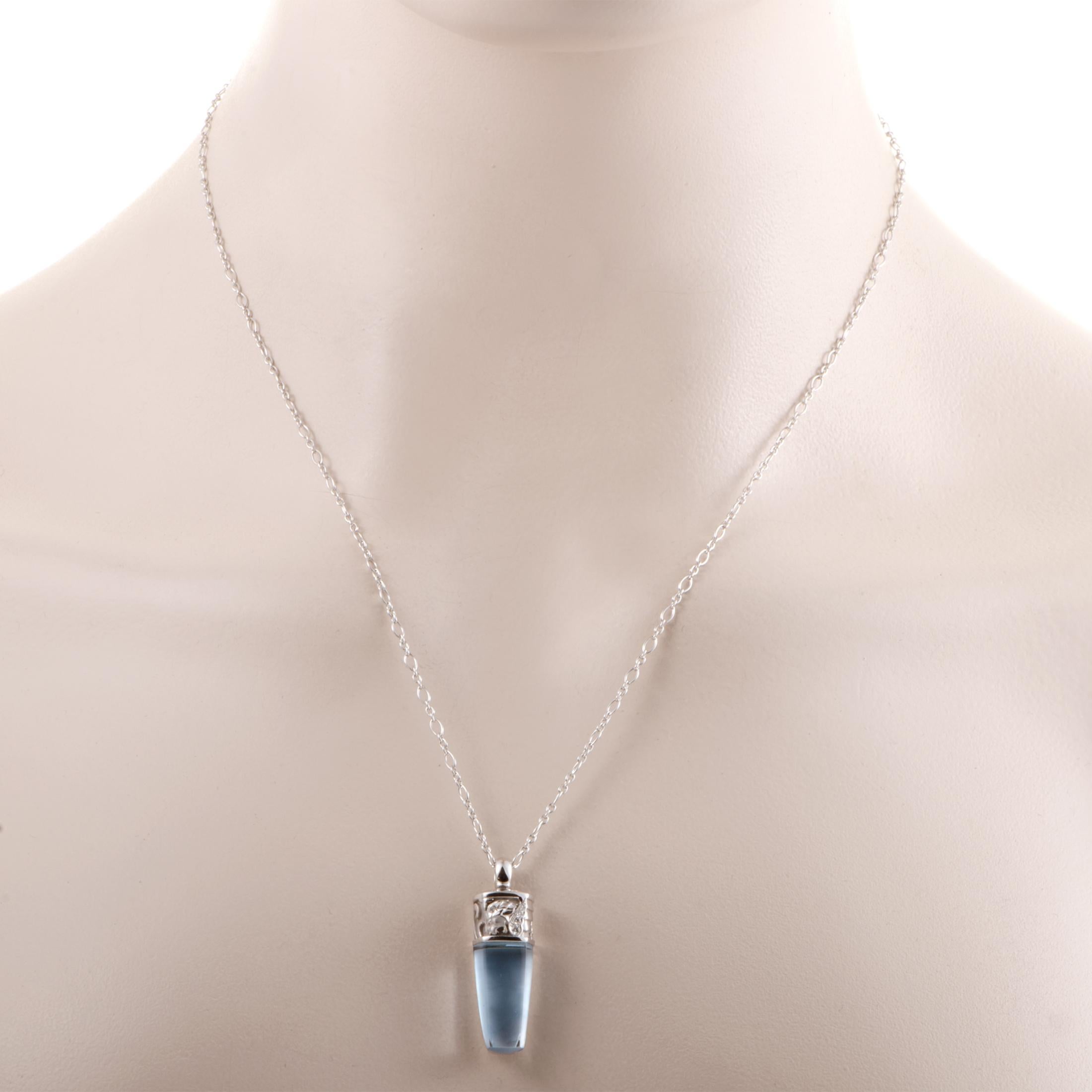 Splendid mother of pearl is laid beneath the sparkling topaz stone weighing 1.80 carats to capture the light and deepen its appealing color in this exceptional 18K white gold necklace from Magerit which is also set with glistening diamonds totaling