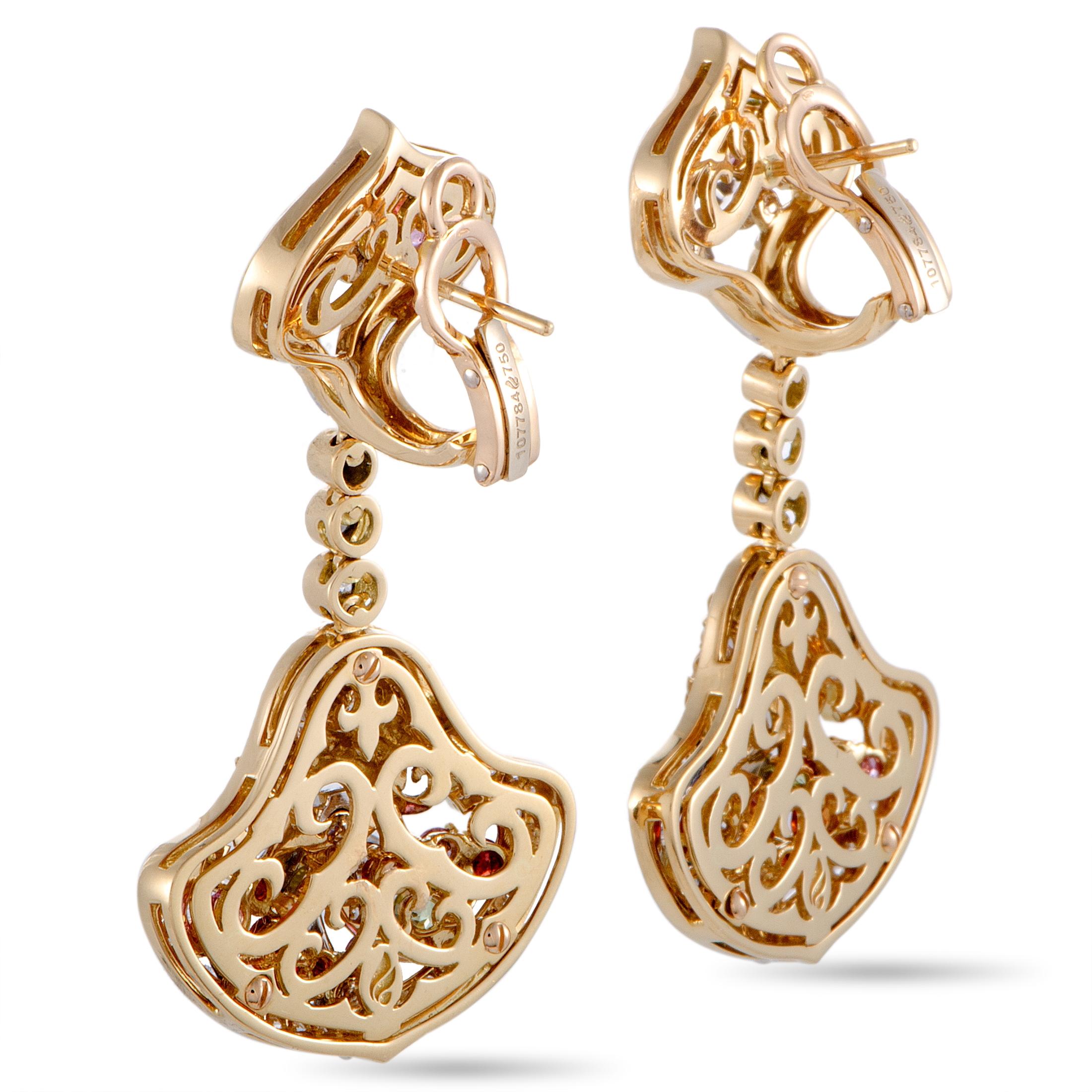 These extravagant “Versailles” earrings from Magerit will attractively accentuate your ensembles thanks to the incredibly imaginative design that is wonderfully topped off with a plethora of eye-catching gems. The pair is made of 18K yellow gold and