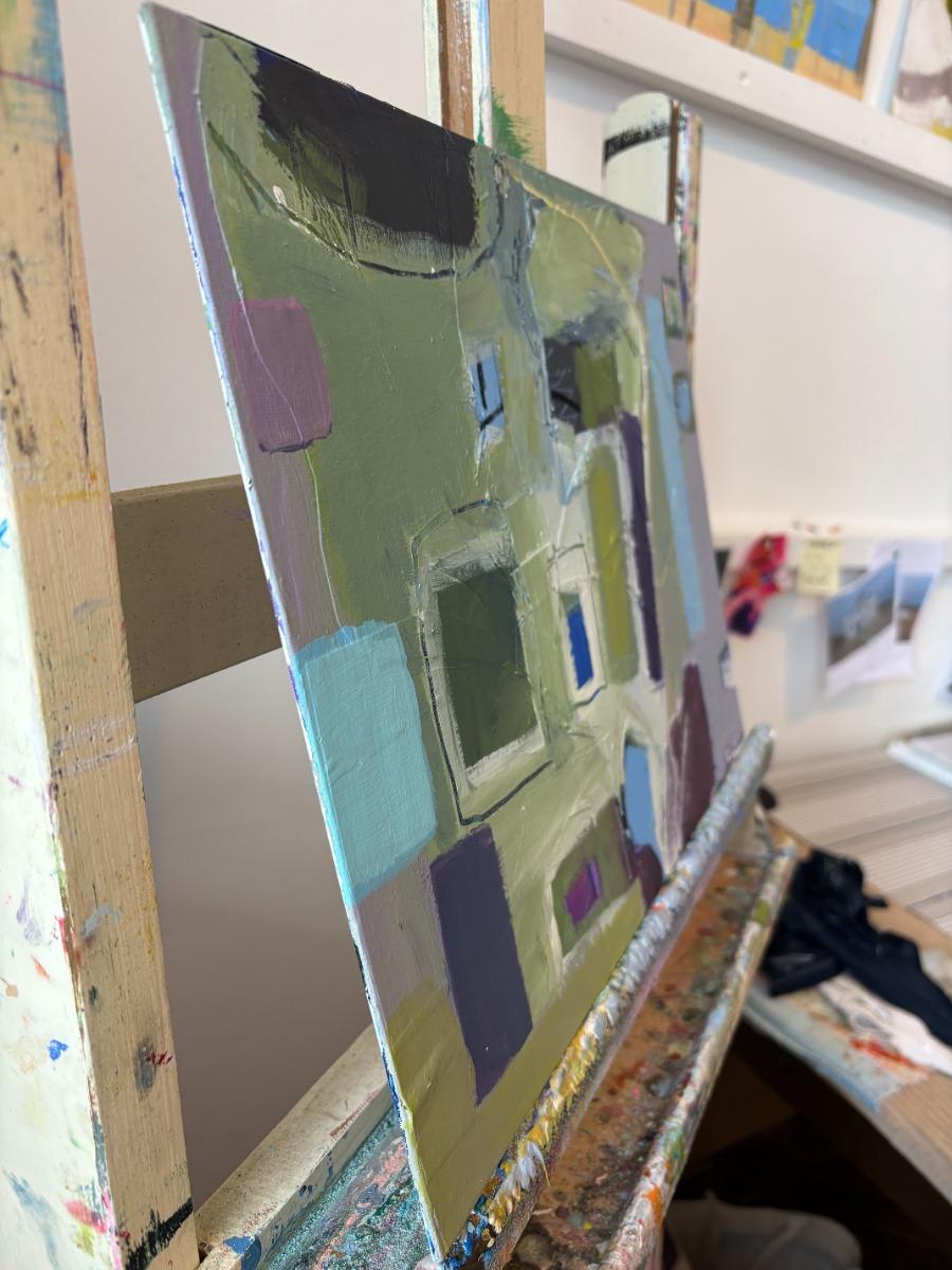 This abstract piece is based on work made in Paphos , it reflects the colours of the plants and gardens along the ocean's edge , the blue of the sea and sky and the roof top of the Greek church . These are the colours and shapes that stayed in my