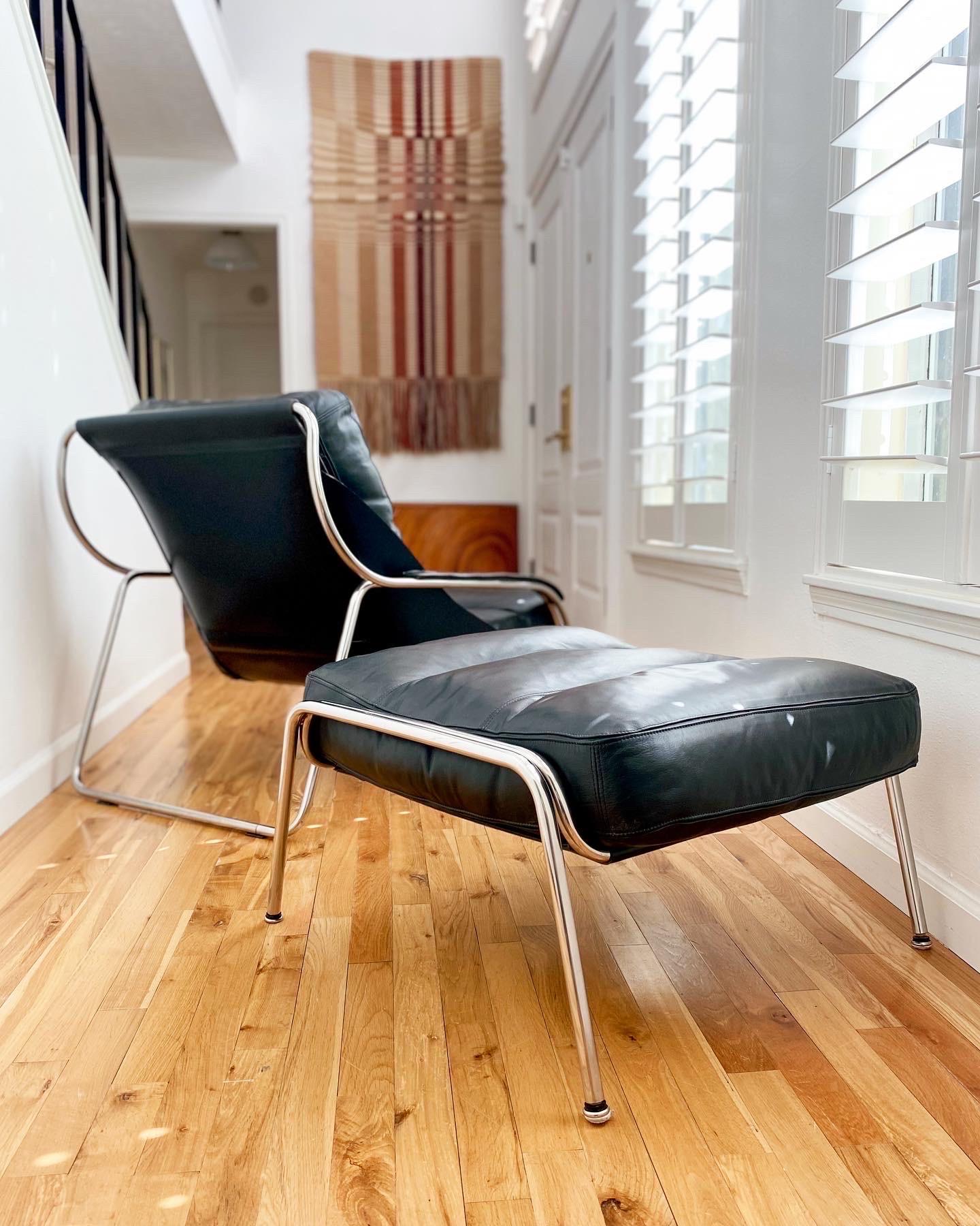 Exquisite Maggiolina lounge chair and pouf designed by Marco Zanuso for MoMa in 1947, made in Italy by Zanotta c.1980s. Sculptural steel frame supports a sling seat and butter-soft cowhide leather cushions filled with goose down. Believe me, this is