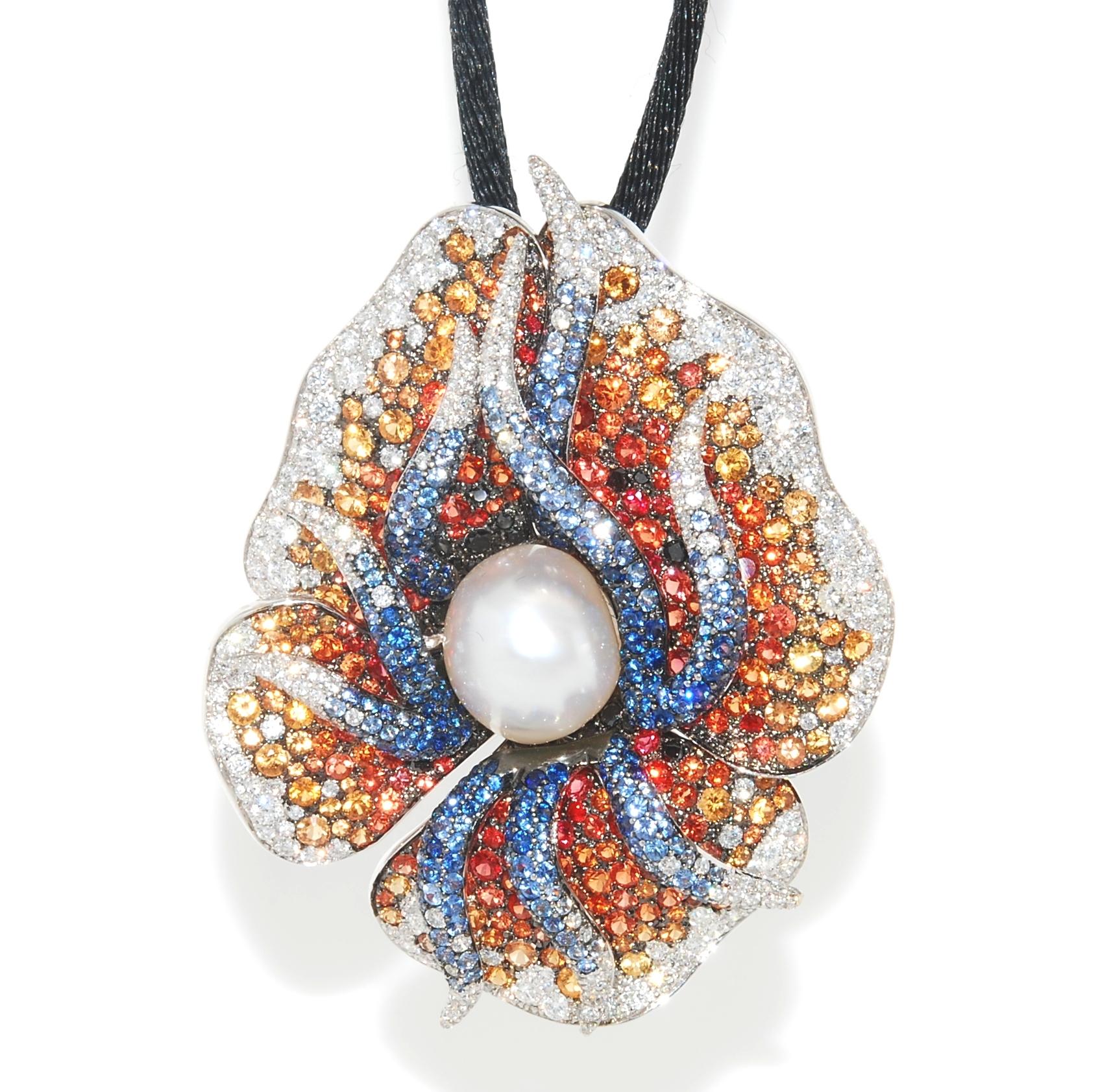 This pendant necklace from Maggioro's Pave & Pearl Collection. The necklace has a black silk cord and is accented with an white gold flower pendant. The flower features a lustrous white pearl  13.9 x 11.5 mm's, accented with 1.26ctw of black and