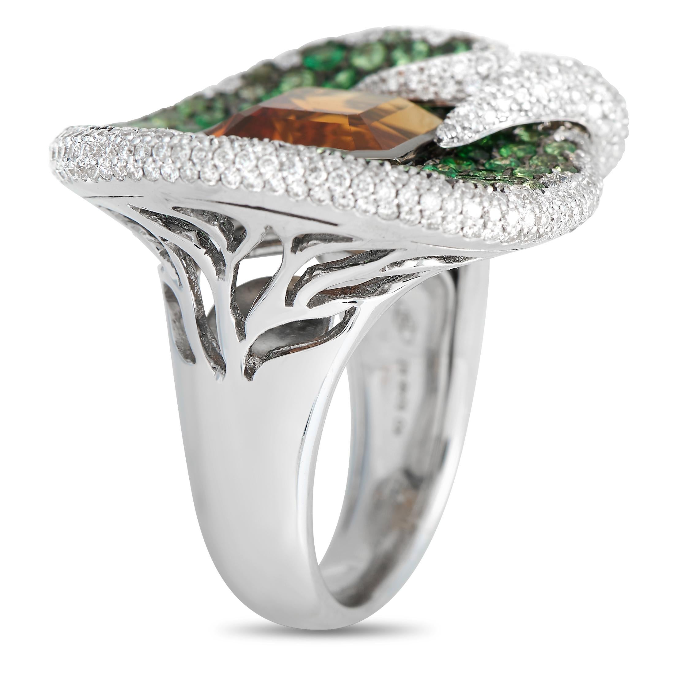This ring from Maggioro's Rhapsody Collection is bright and beautiful. It is made of 18K white gold and boasts a design that features an 21.09 carat orange citrine stone accented with 3.09 carats of tsavorite. Lastly, the colored stones are accented