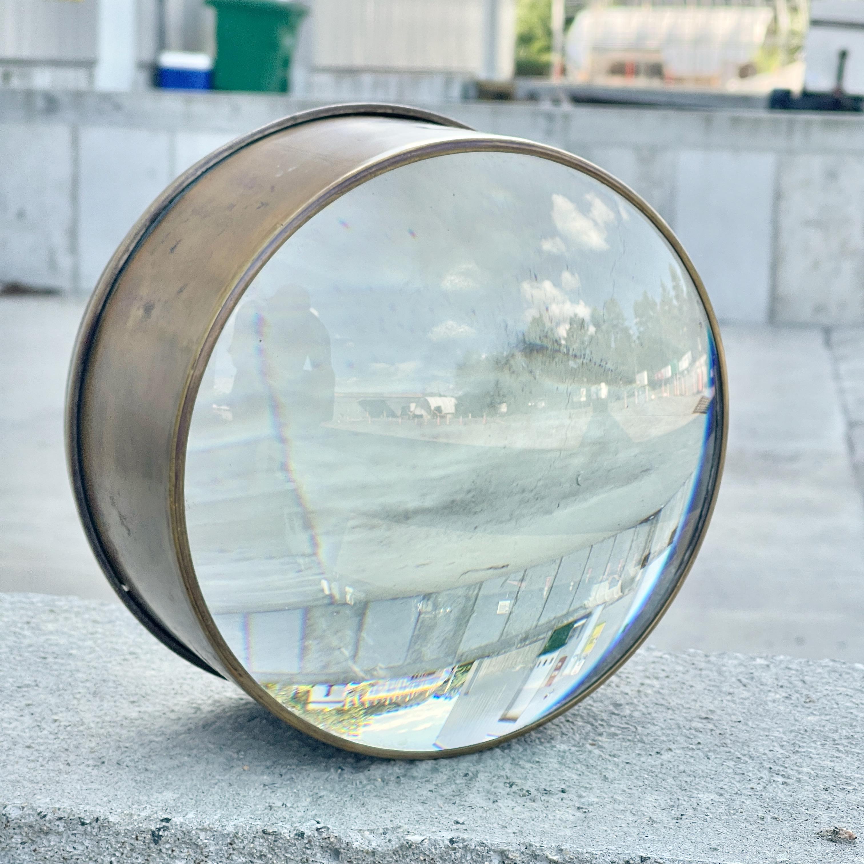 One of the largest we've ever seen. 
We thought about fitting it with a a light socket and a wall bracket to use as a wall sconce but this is simply too tactile, useful and fun to play with as a desk accessory.