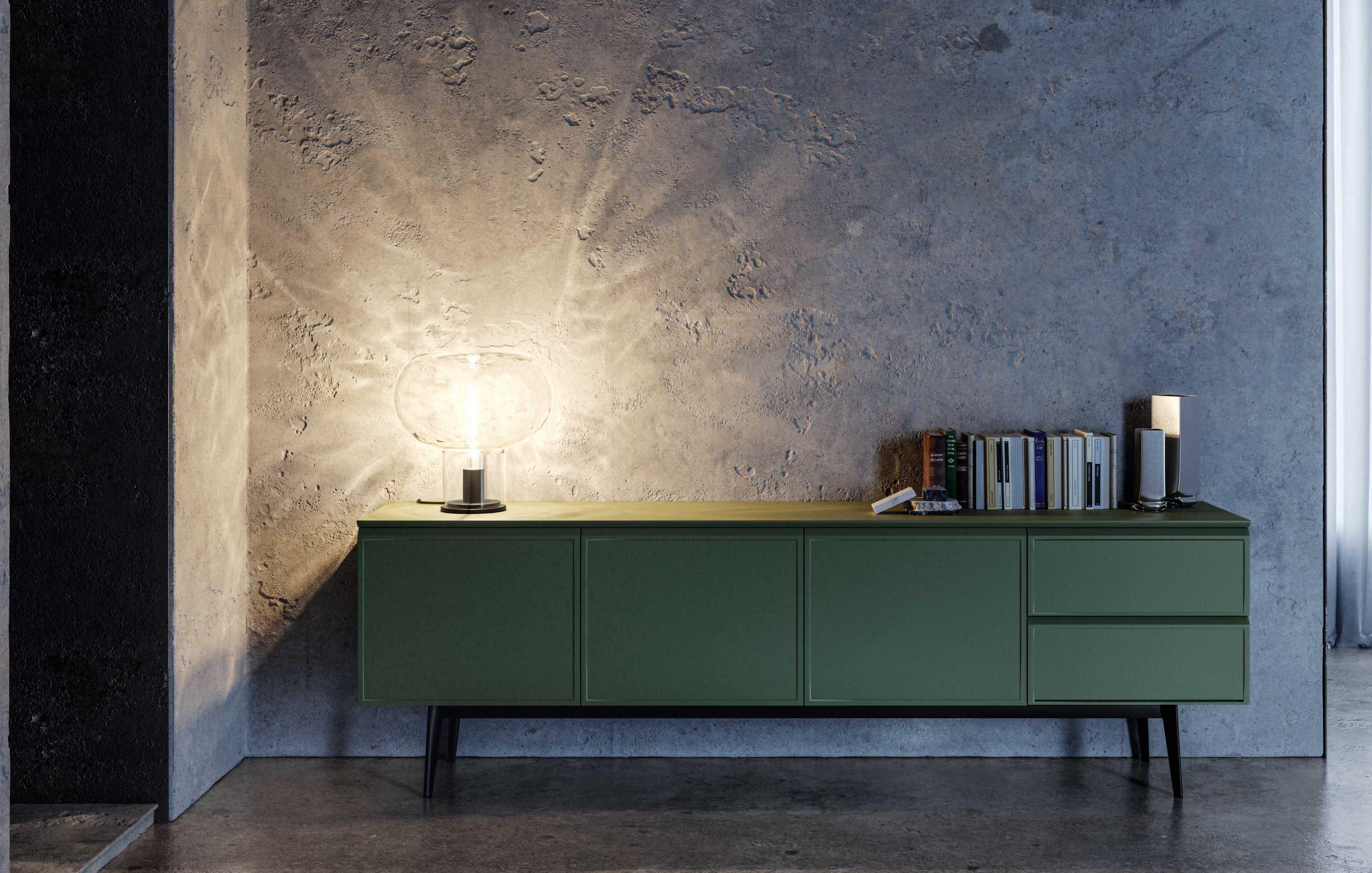 Magic Mushroom evokes blown glass lamps with a retro flavour, reinterpreting their surface.

Magic Mushroom consists of a steel base that houses a blown glass lampshade. The lamp is available in a single size measuring 38 cm in diameter. The steel