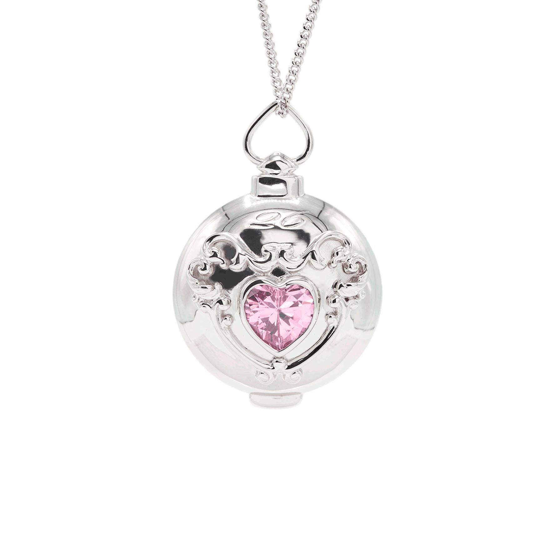 Our special Pleasure collection for everyday wear, set with two pink heart shape zirconias, could store some small stones or any specious little creatures you would like to carry on everyday.

Dimensions:
25mm x 25mm, chain 60cm           