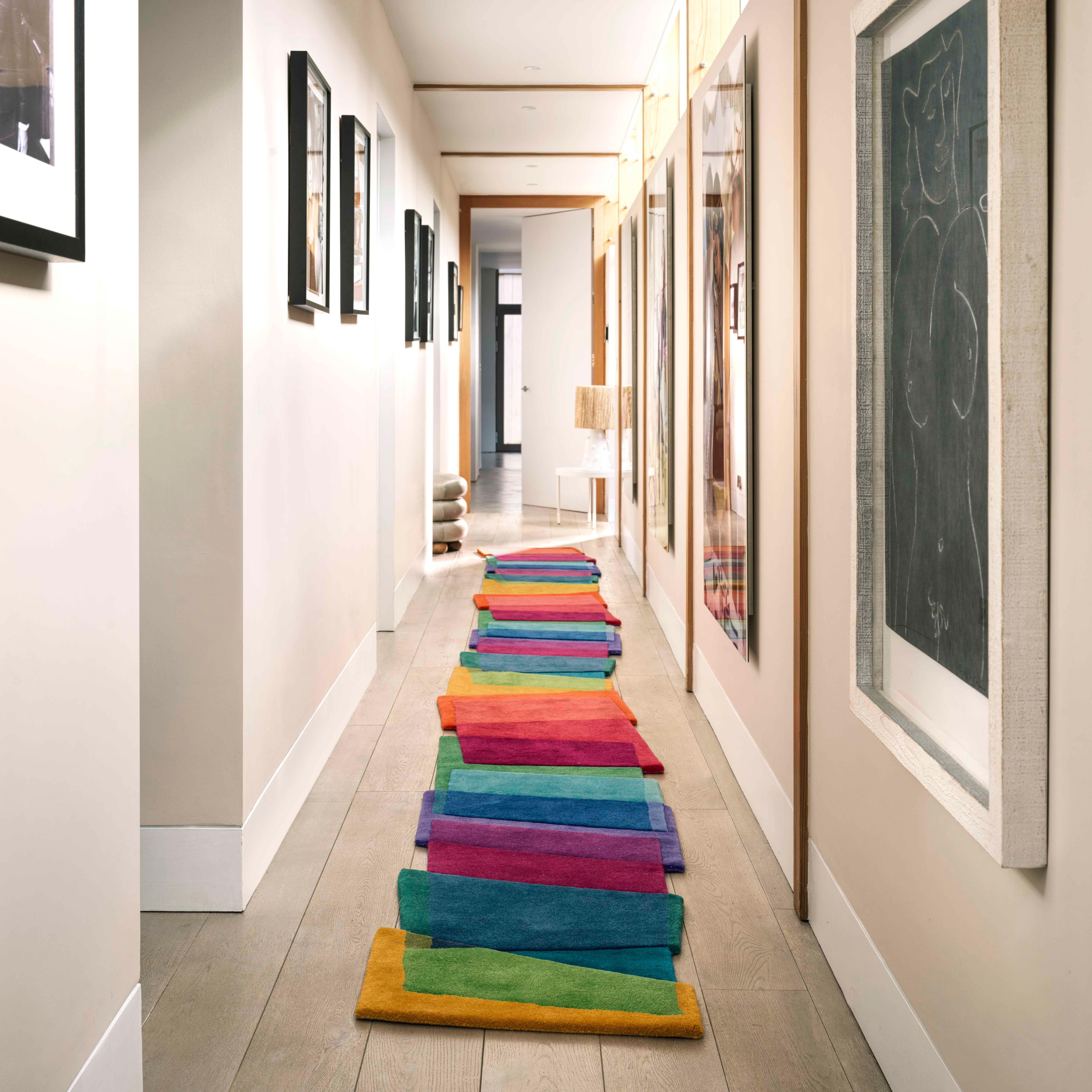 Magic Stepping Stones (Vibrant) is a highly interactive and visually striking design that celebrates the power of colour in transforming homes.

The irregular shape and unusual composition of the rug introduced through intricate hand carving breaks