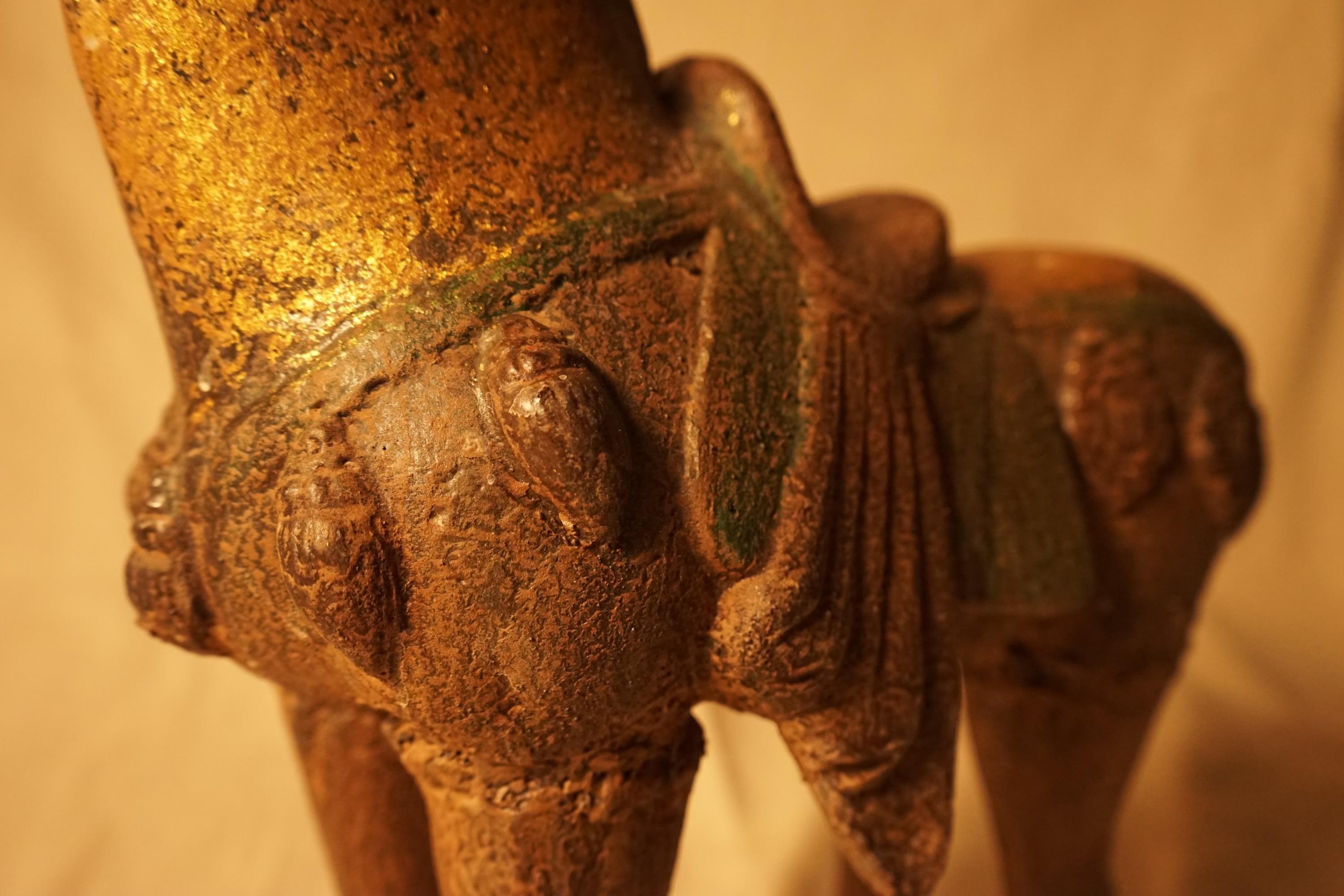 Character rich aged gilded metal horse having a tribal Chinese vibe and wonderful patina.