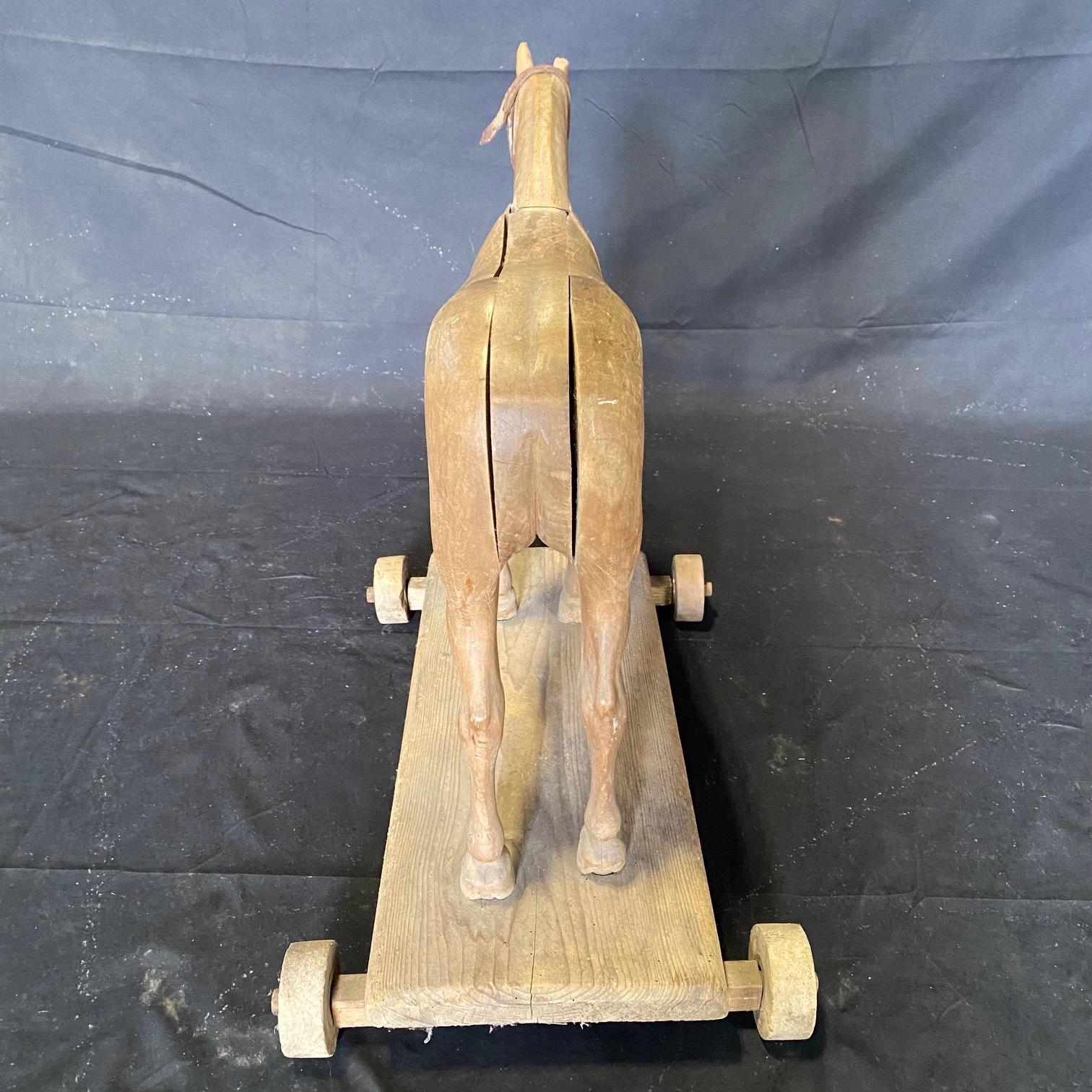 Magical Large 19th Century French Beautifully Carved Wooden Horse Pull Toy For Sale 2