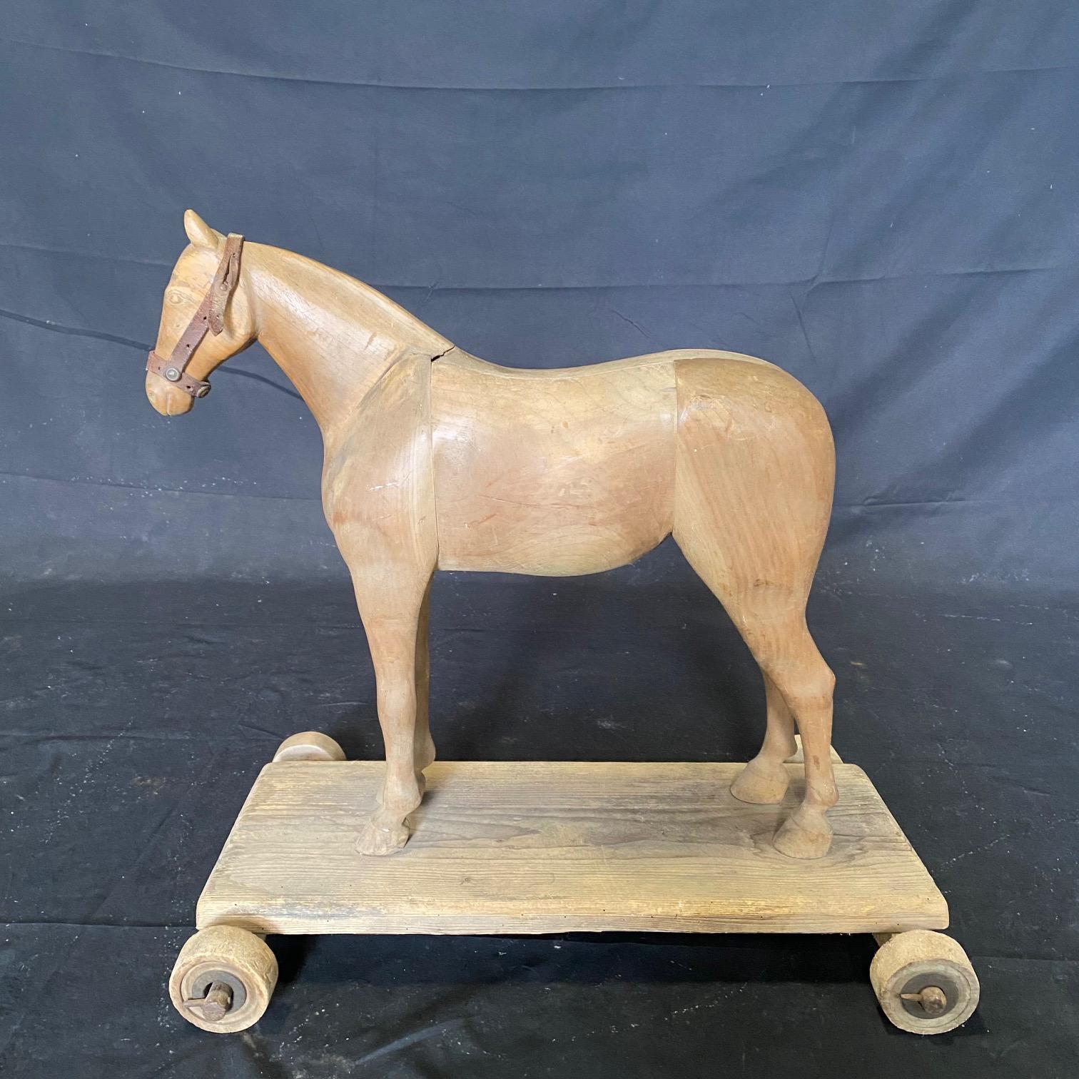Magical Large 19th Century French Beautifully Carved Wooden Horse Pull Toy For Sale 3