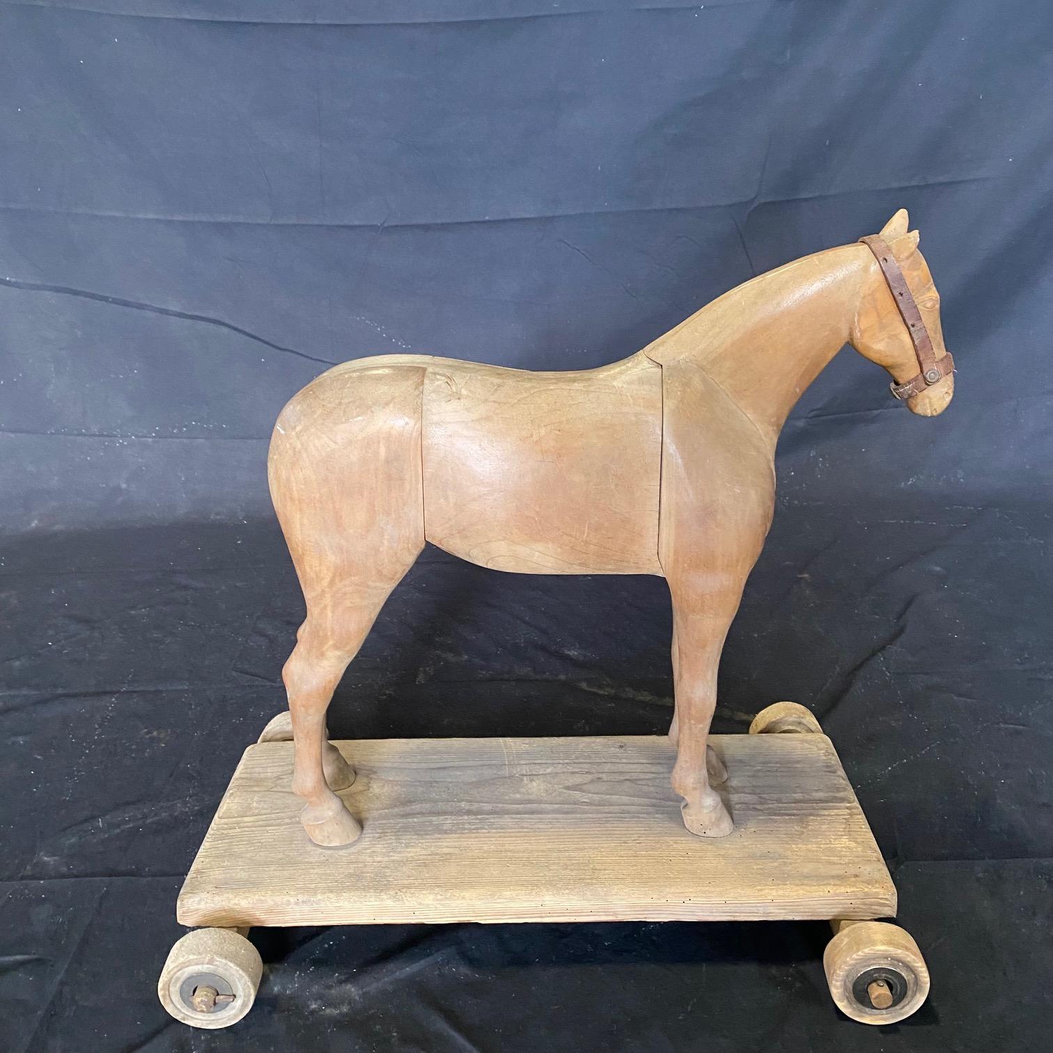 Magical Large 19th Century French Beautifully Carved Wooden Horse Pull Toy For Sale 4