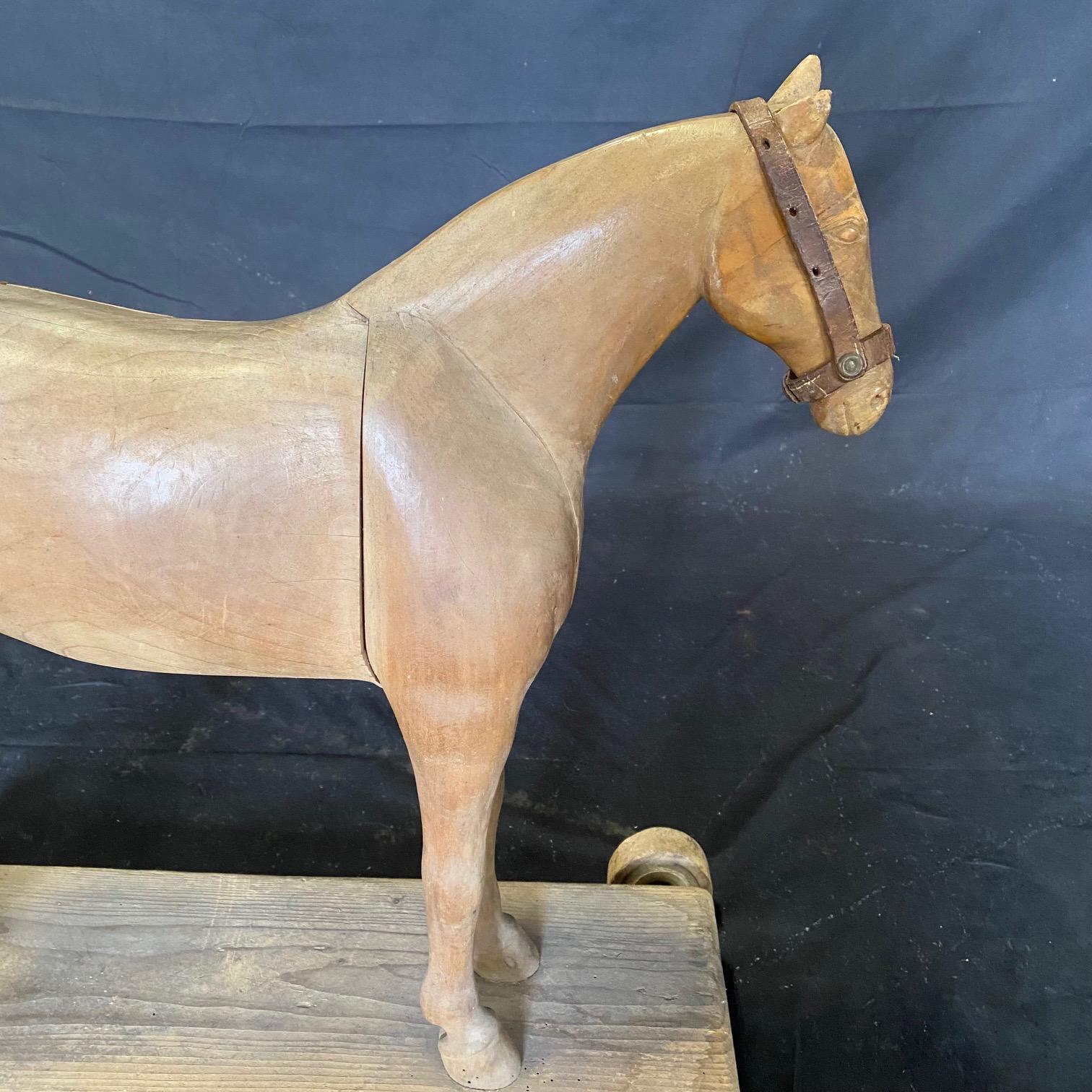Magical Large 19th Century French Beautifully Carved Wooden Horse Pull Toy For Sale 5