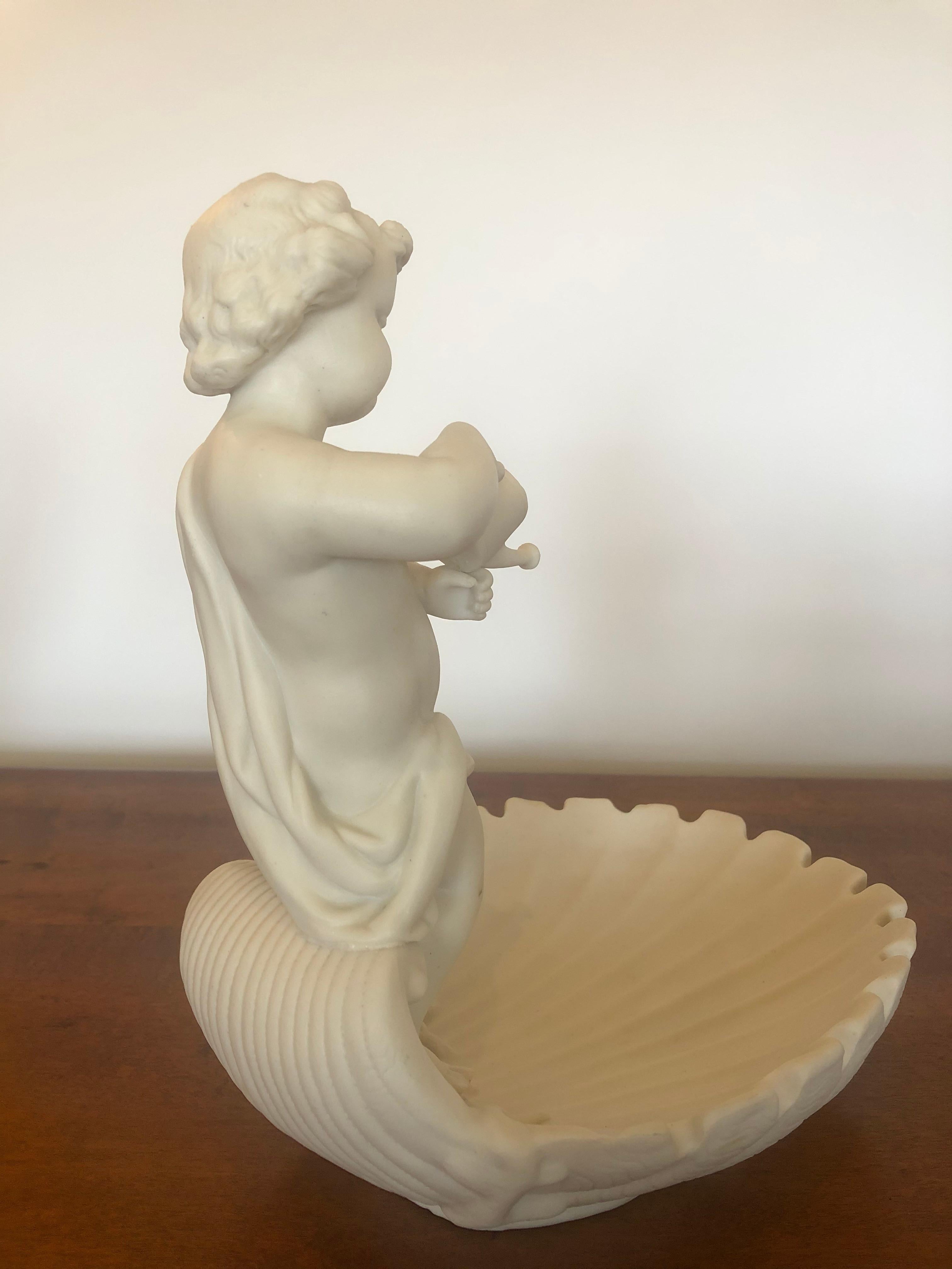 Magical Parian Porcelain Shell Motif Dish with Sculptural Putti In Good Condition For Sale In Hopewell, NJ
